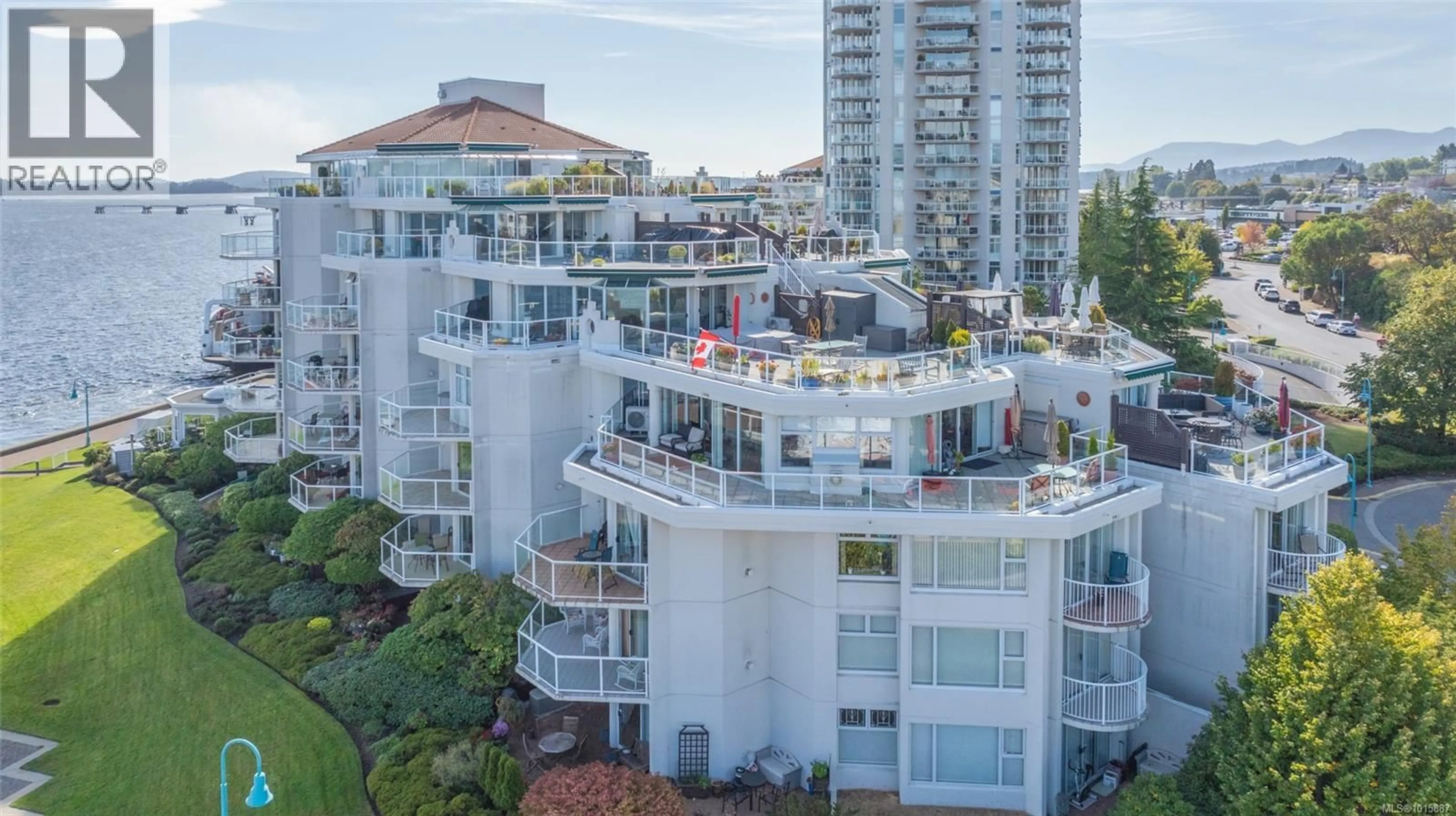 A pic from outside/outdoor area/front of a property/back of a property/a pic from drone, city buildings view from balcony for 207 - 150 PROMENADE DRIVE, Nanaimo British Columbia V9R6M6