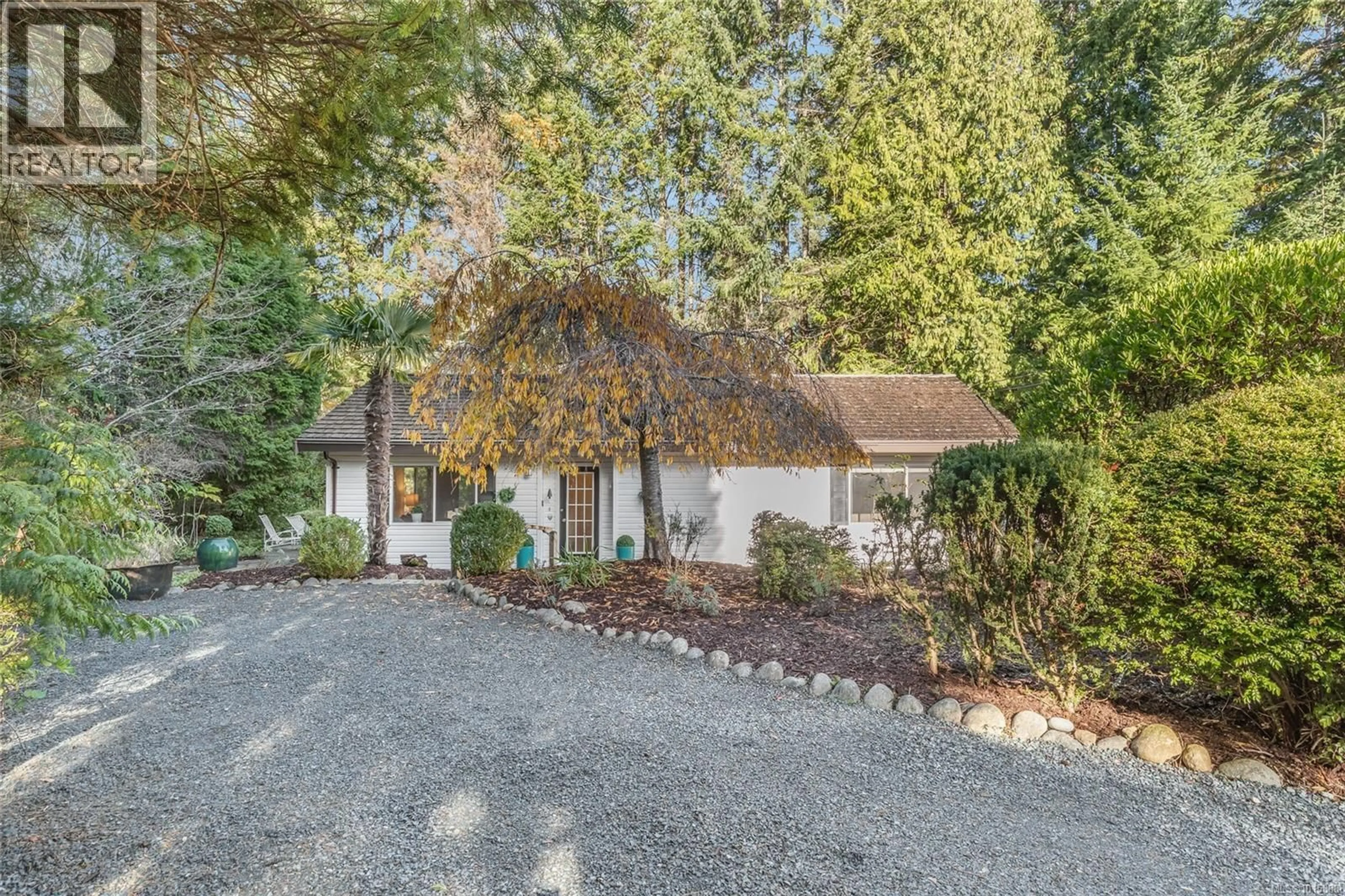 A pic from outside/outdoor area/front of a property/back of a property/a pic from drone, street for 503 QUATNA ROAD, Qualicum Beach British Columbia V9K1B4