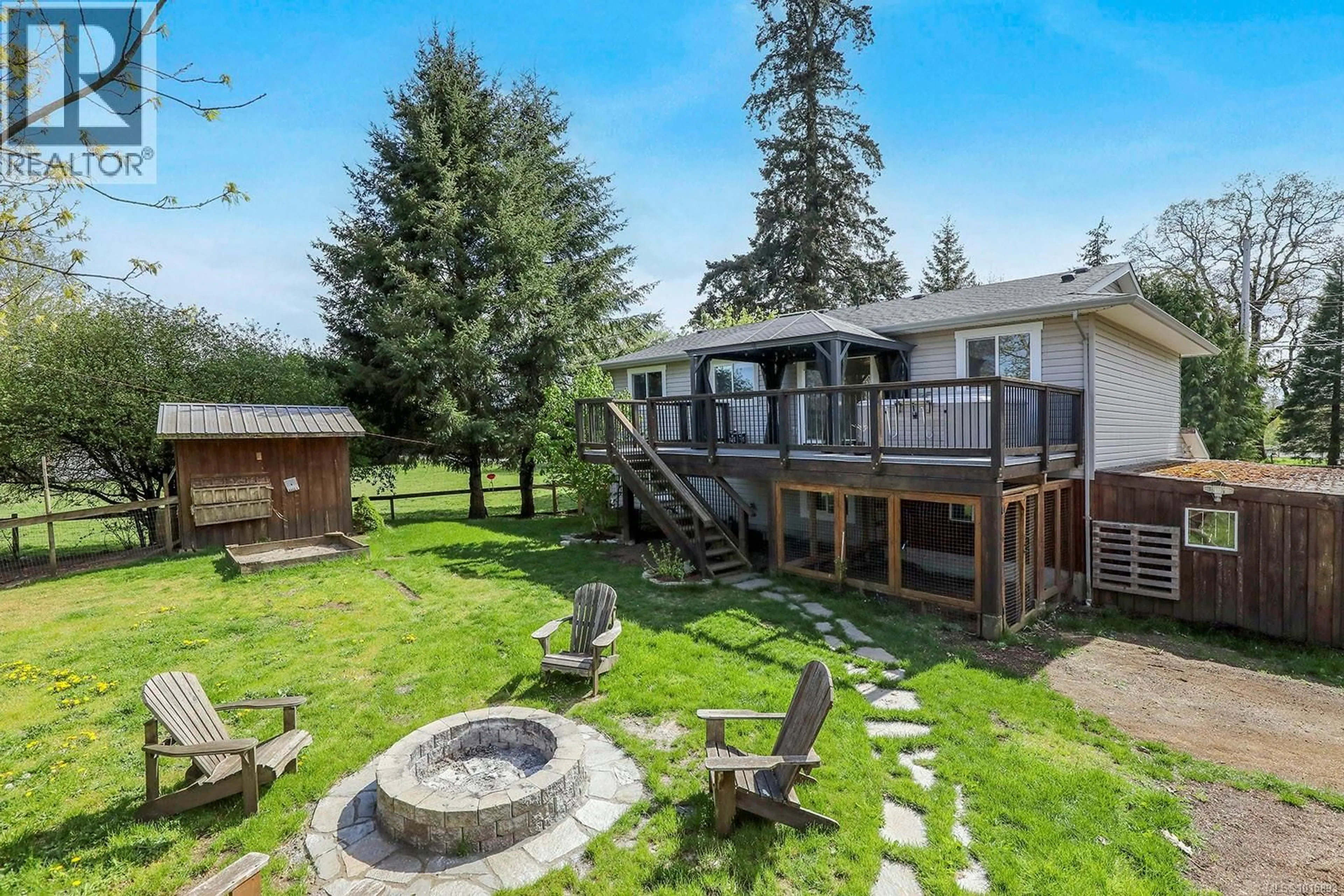 A pic from outside/outdoor area/front of a property/back of a property/a pic from drone, water/lake/river/ocean view for 5252 HEADQUARTERS ROAD, Courtenay British Columbia V9J1M1
