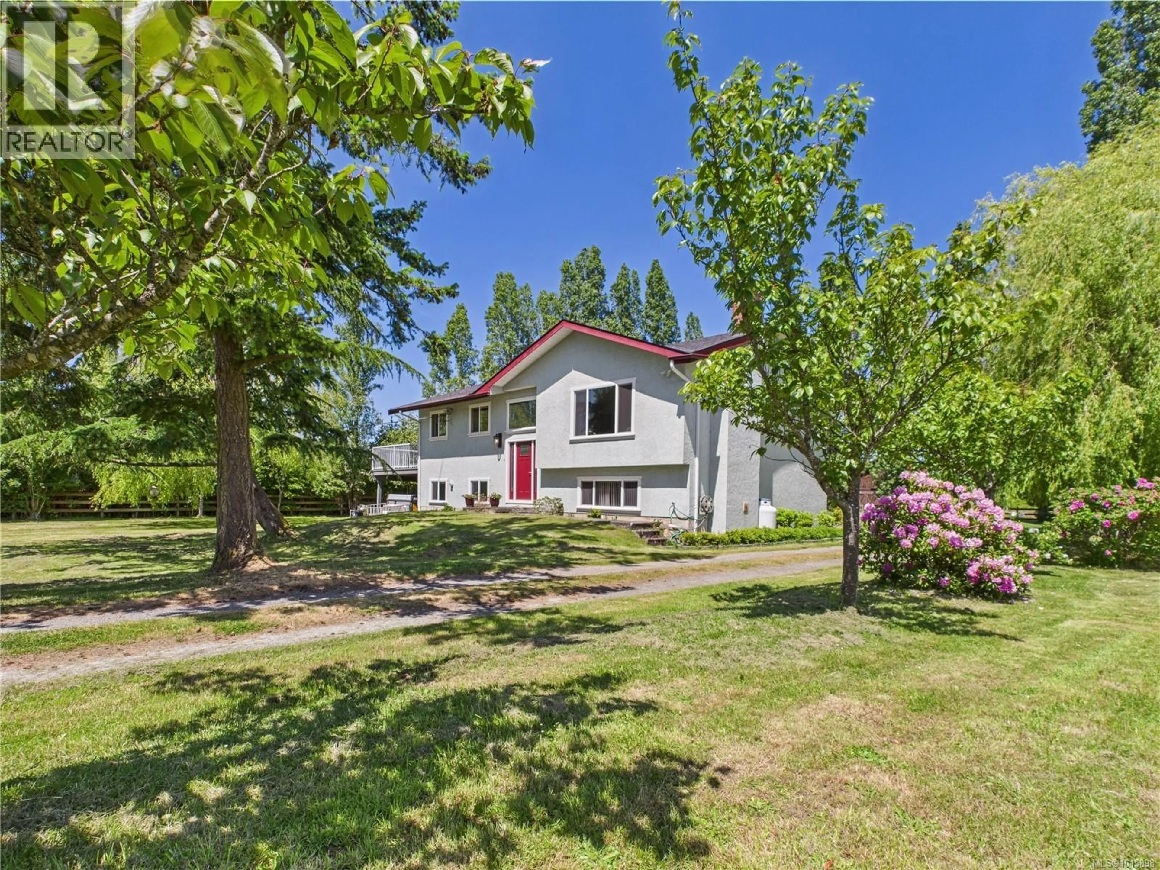 A pic from outside/outdoor area/front of a property/back of a property/a pic from drone, street for 1920 MILLS ROAD, North Saanich British Columbia V8L5S9
