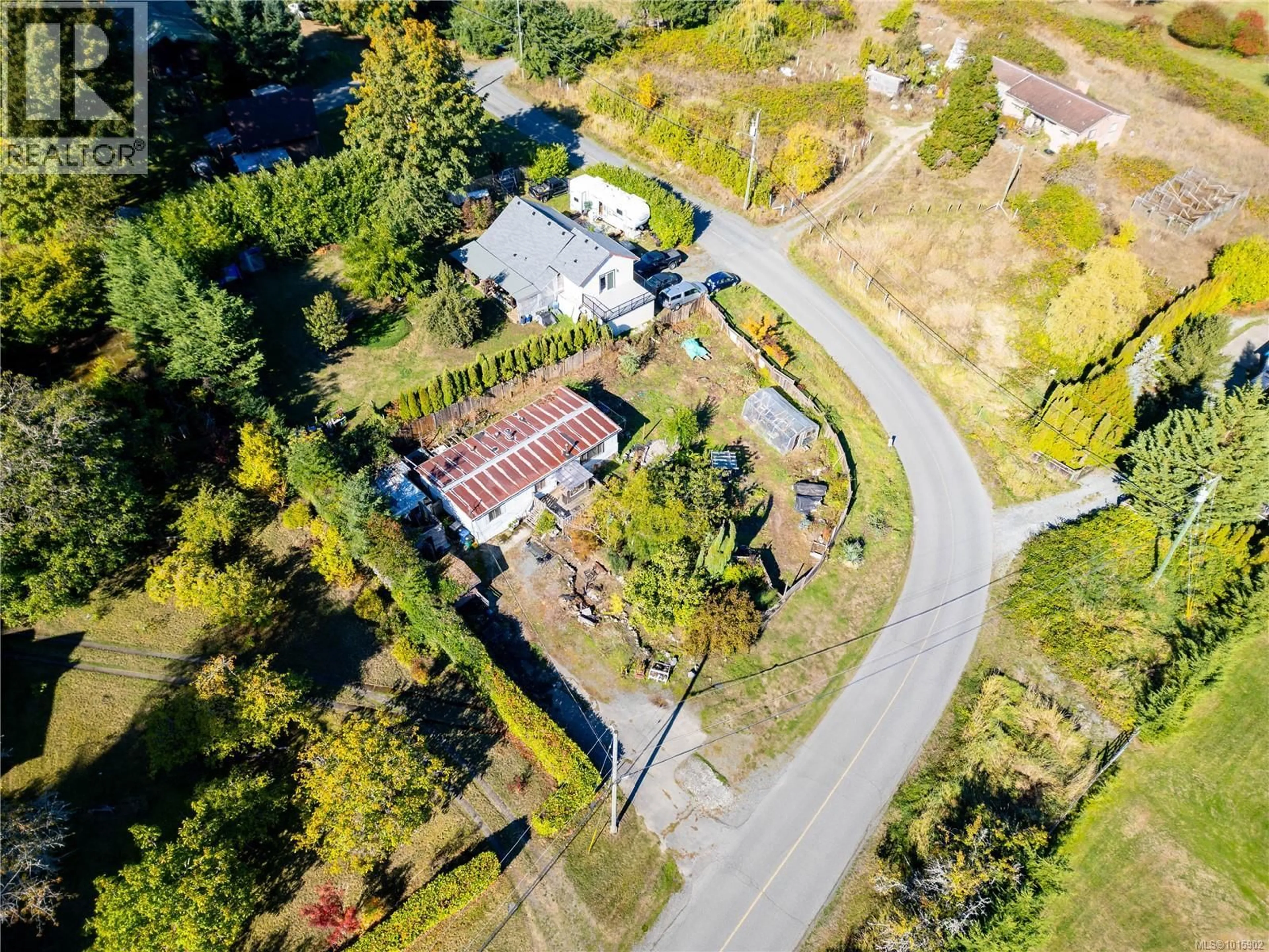 A pic from outside/outdoor area/front of a property/back of a property/a pic from drone, street for 5010 GROUHEL ROAD, Ladysmith British Columbia V9G1J5