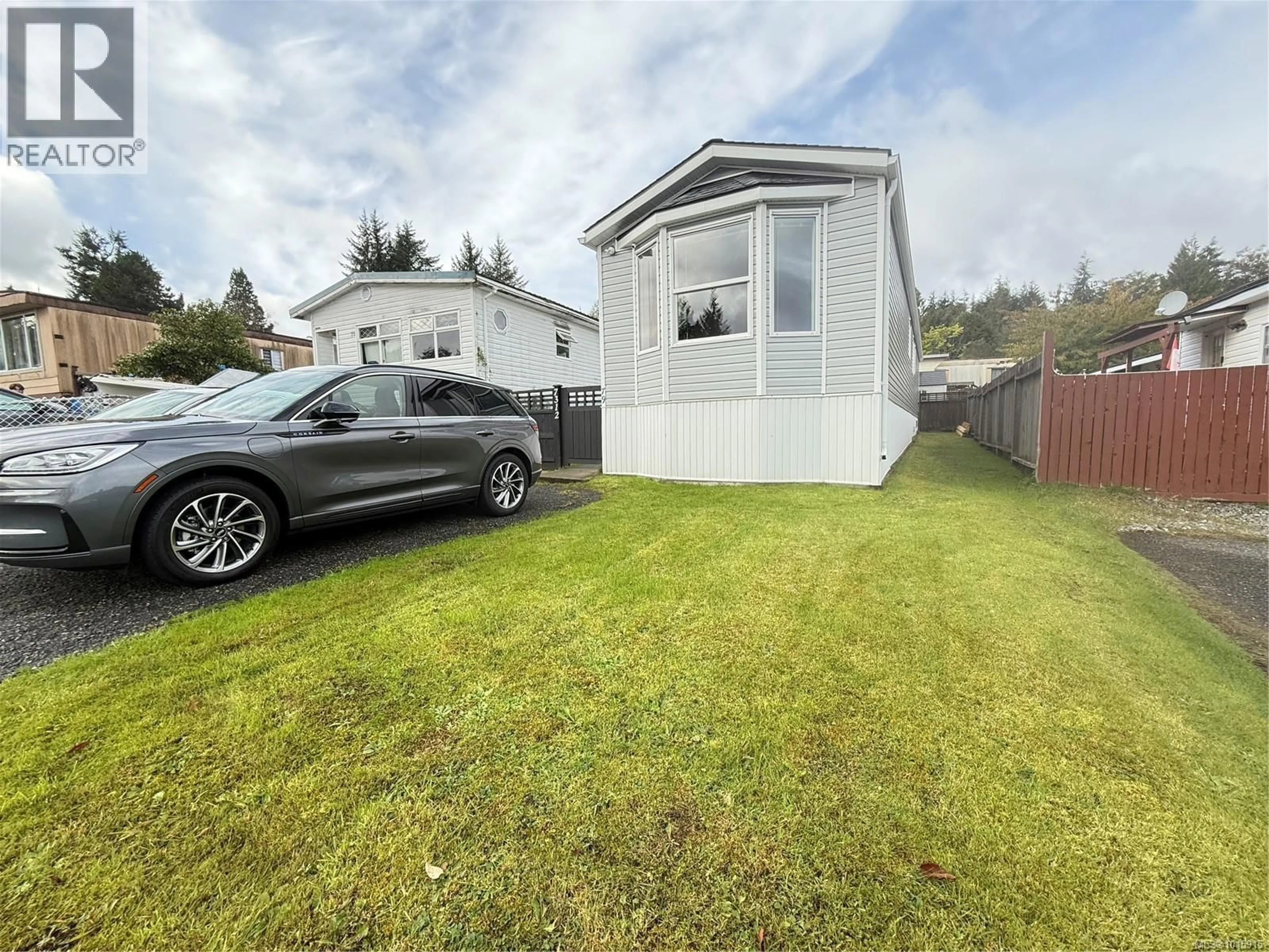 A pic from outside/outdoor area/front of a property/back of a property/a pic from drone, street for 7312 KLAKISH PLACE, Port Hardy British Columbia V0N2P0
