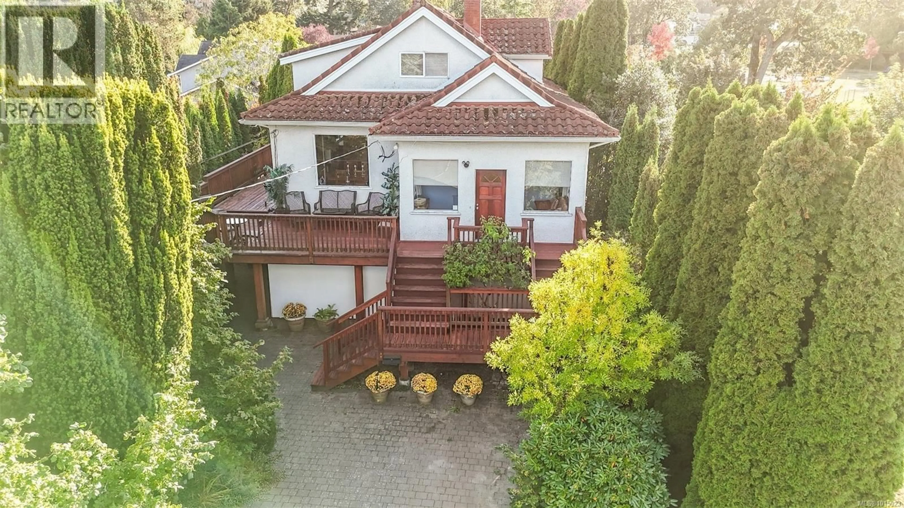 A pic from outside/outdoor area/front of a property/back of a property/a pic from drone, street for 1295 SANTA ROSA AVENUE, Saanich British Columbia V8Z2V5