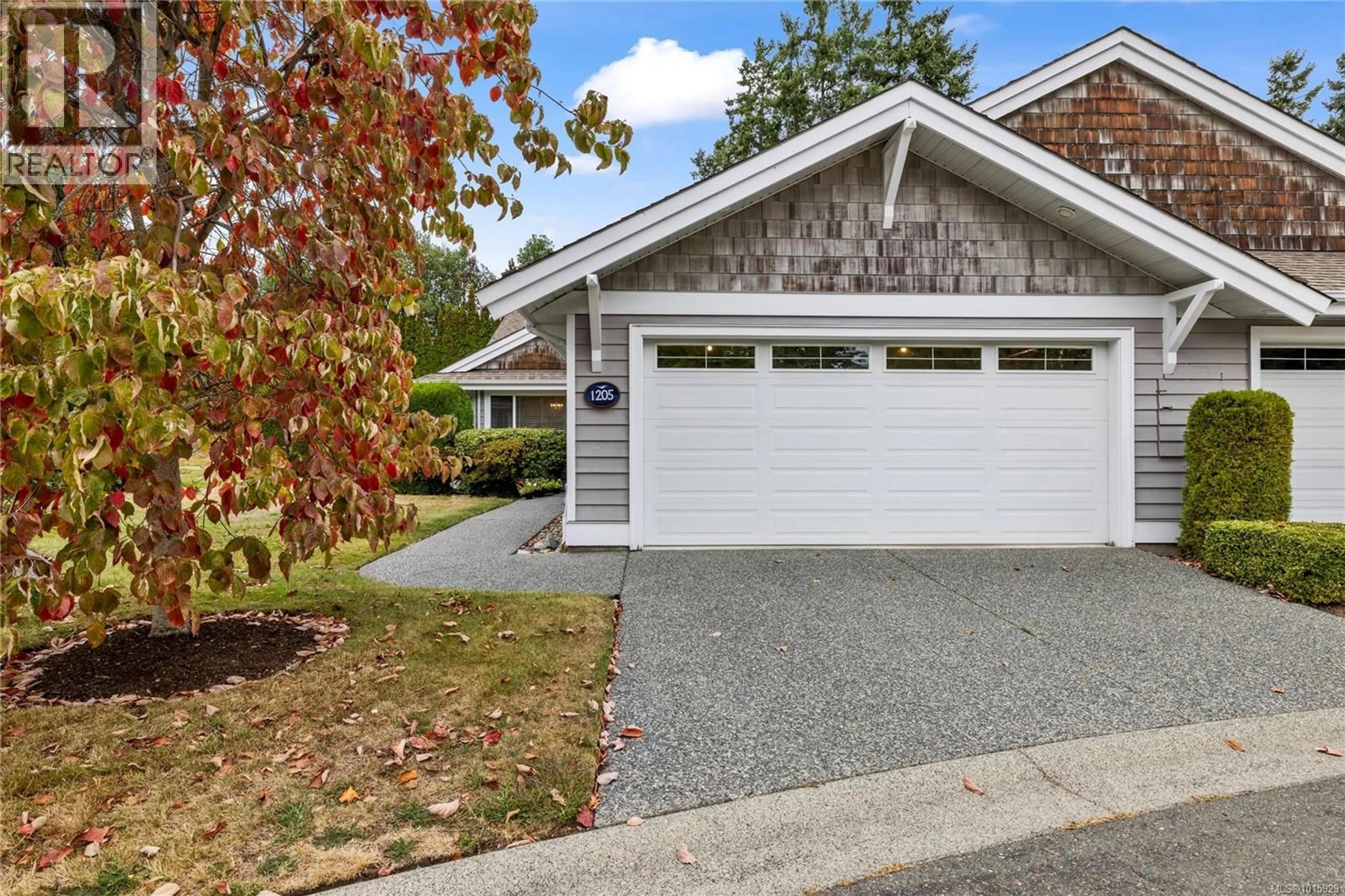 Home with vinyl exterior material, street for 1205 SATURNA DRIVE, Parksville British Columbia V9P2X5