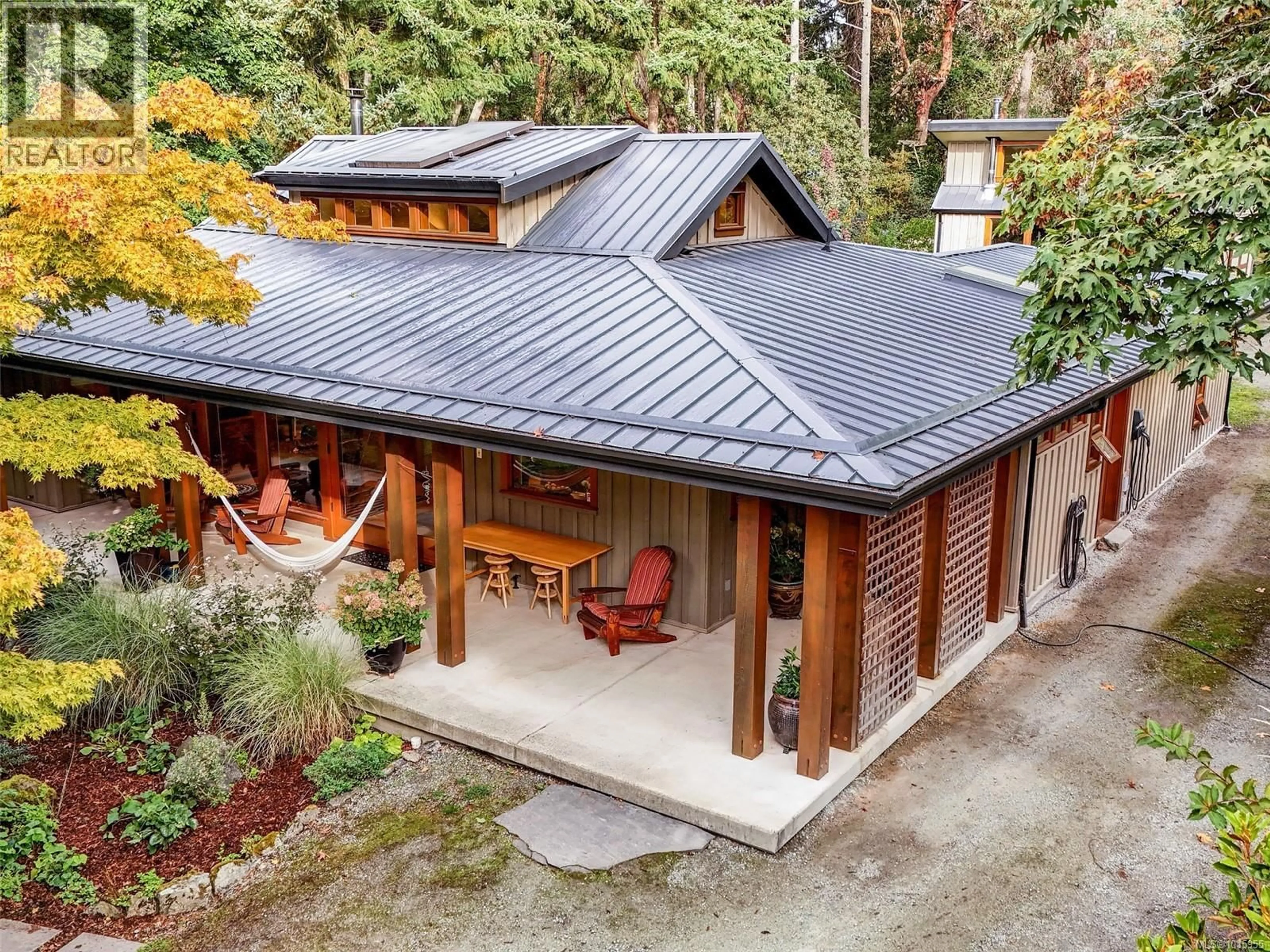 A pic from outside/outdoor area/front of a property/back of a property/a pic from drone, street for 590 DOWNEY ROAD, North Saanich British Columbia V8L5M6