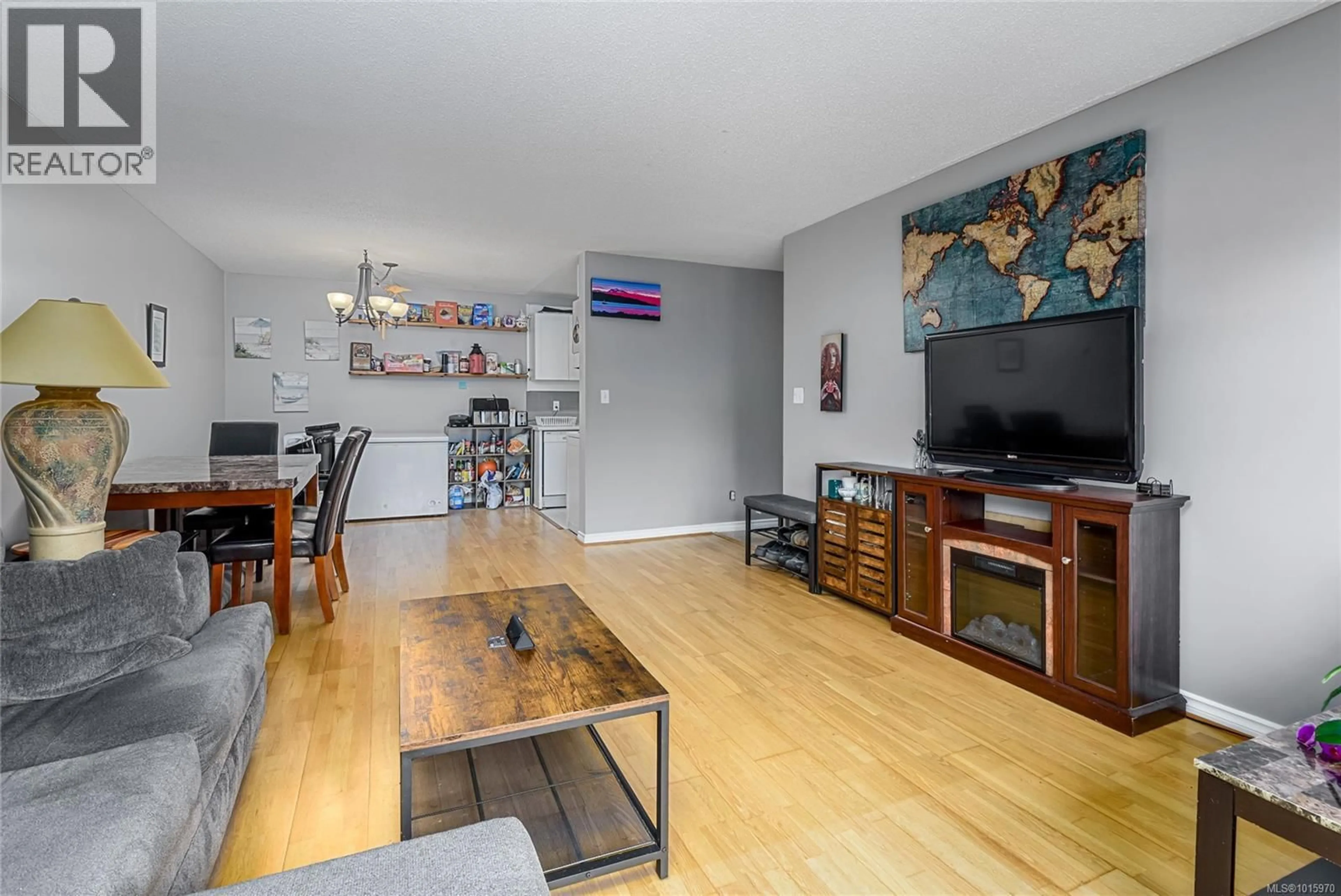 Living room with furniture, wood/laminate floor for 307A - 178 BACK ROAD, Courtenay British Columbia V9N3W6