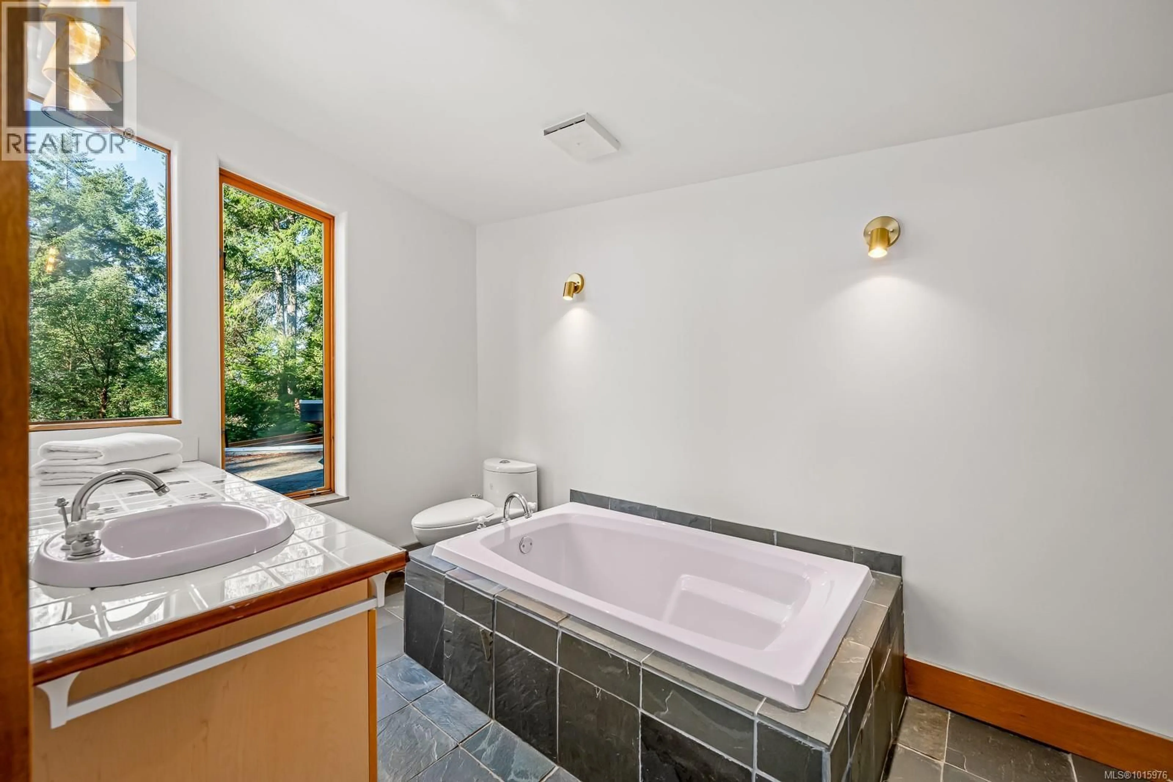 Standard bathroom, ceramic/tile floor for 6161 LACON ROAD, Denman Island British Columbia V0R1T0