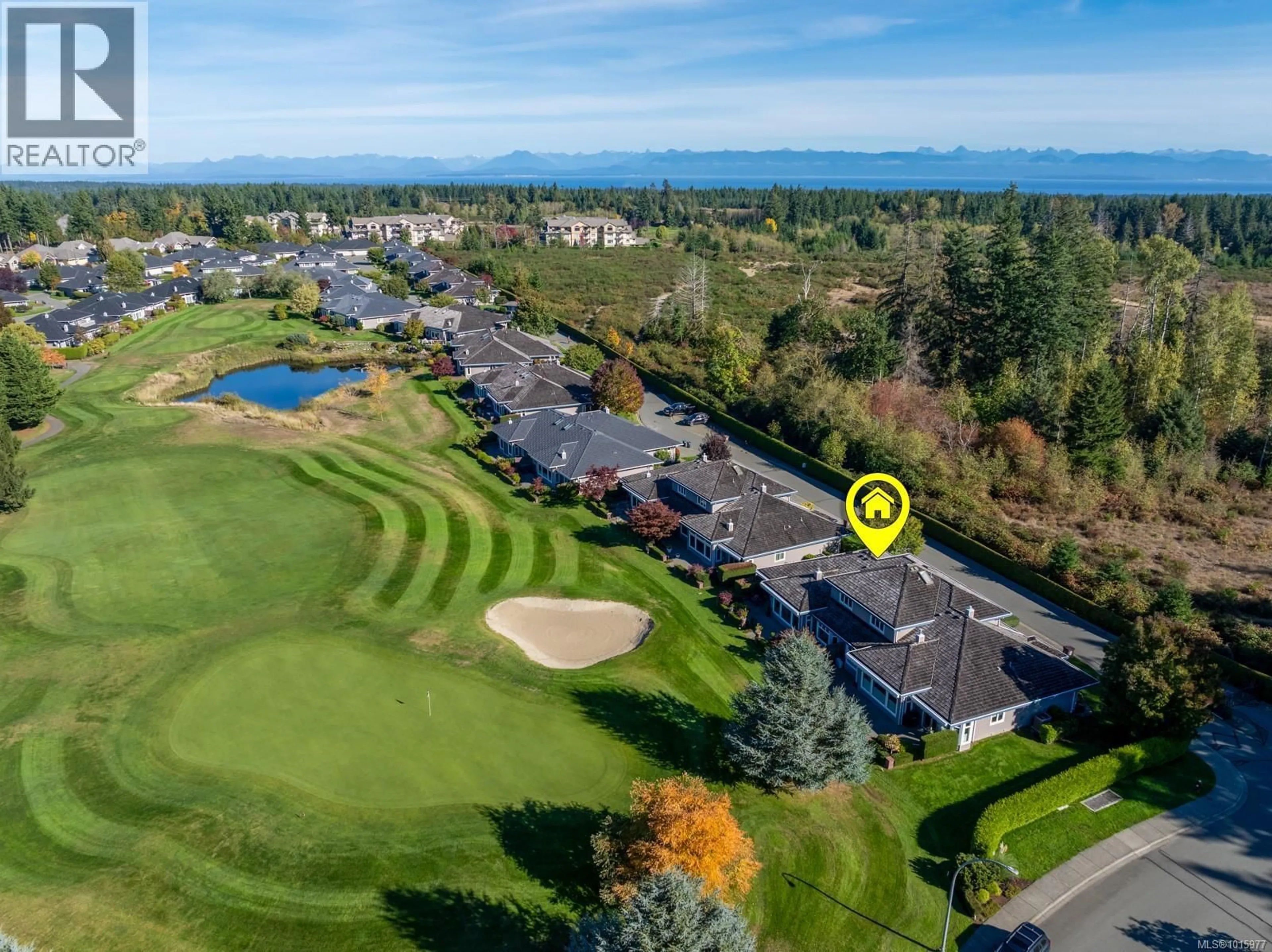 A pic from outside/outdoor area/front of a property/back of a property/a pic from drone, water/lake/river/ocean view for 353 - 3399 CROWN ISLE DRIVE, Courtenay British Columbia V9N9X7