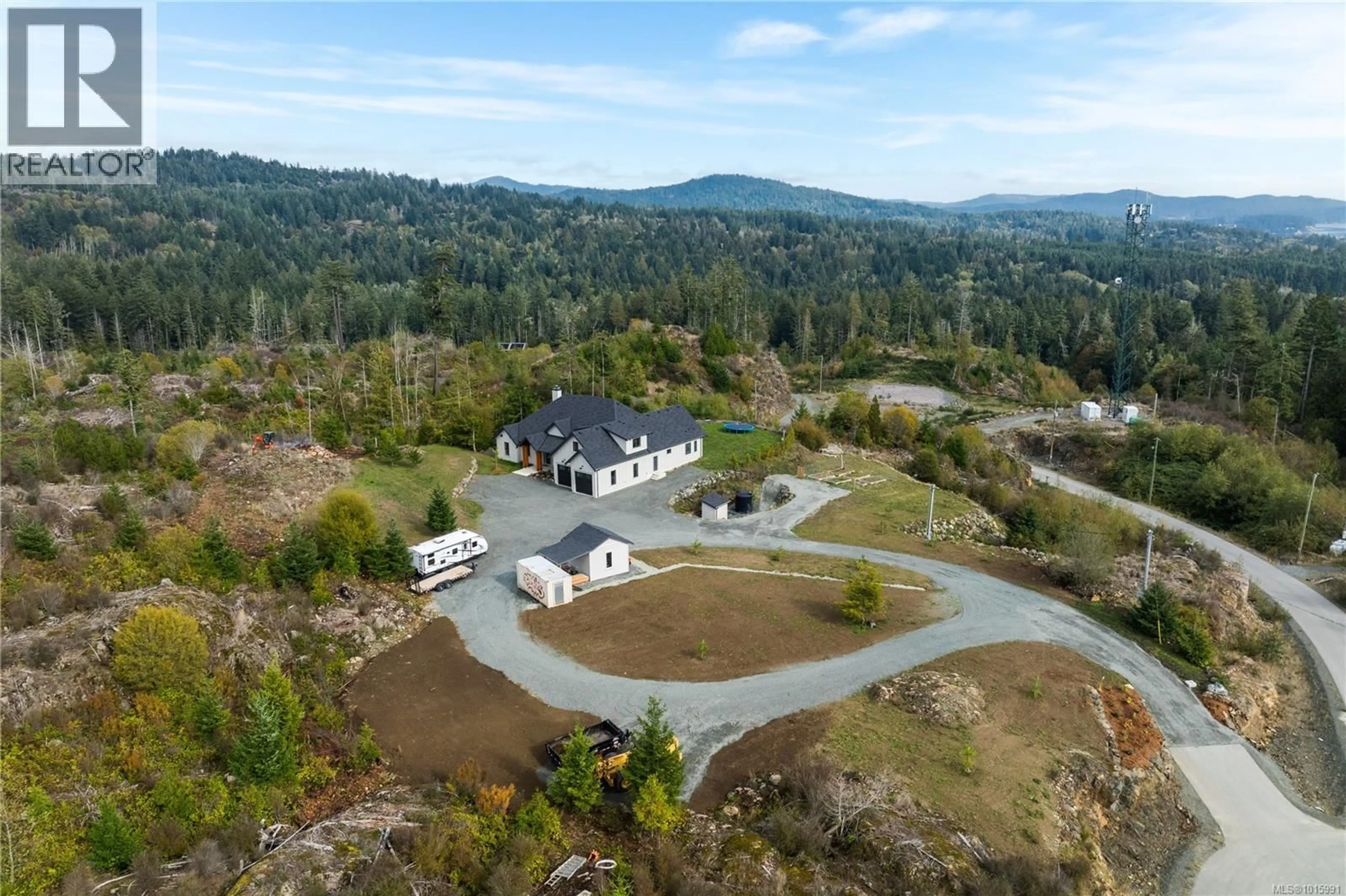 A pic from outside/outdoor area/front of a property/back of a property/a pic from drone, mountain view for 2550 AYTHREE WAY, Sooke British Columbia V9Z0K5