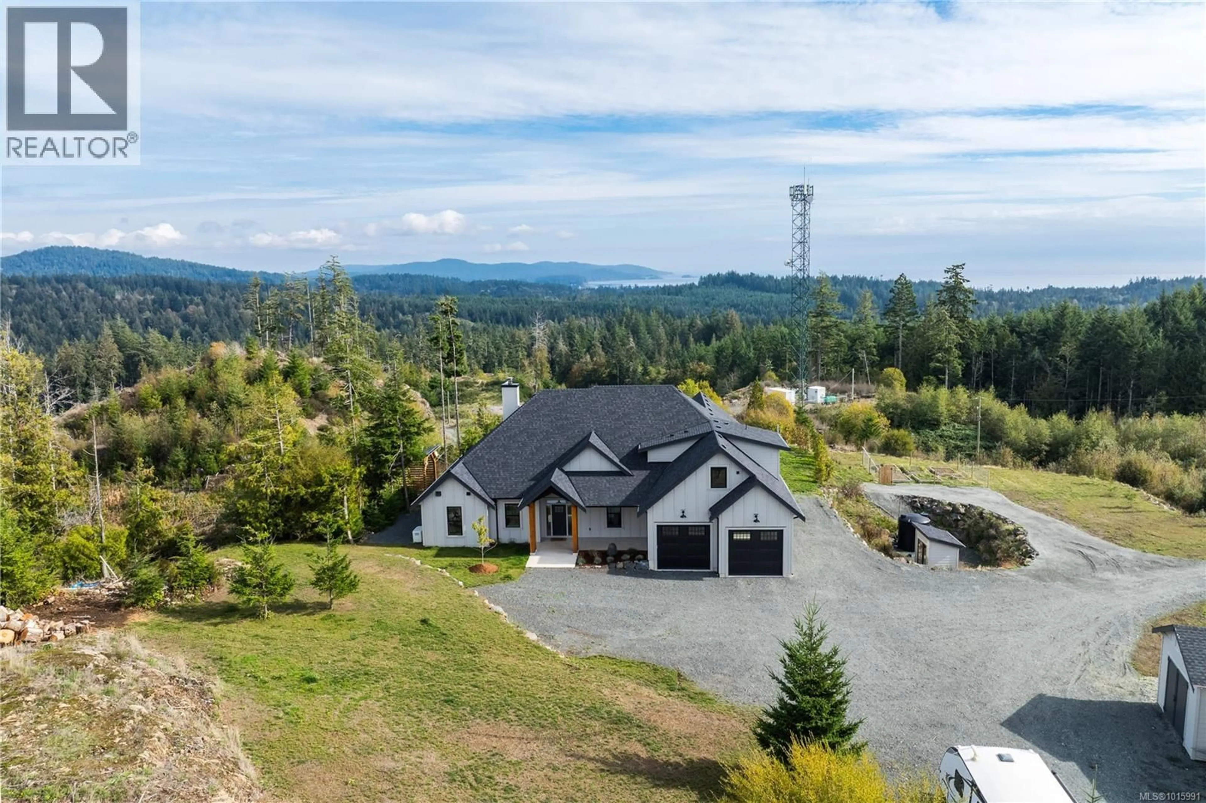 A pic from outside/outdoor area/front of a property/back of a property/a pic from drone, mountain view for 2550 AYTHREE WAY, Sooke British Columbia V9Z0K5