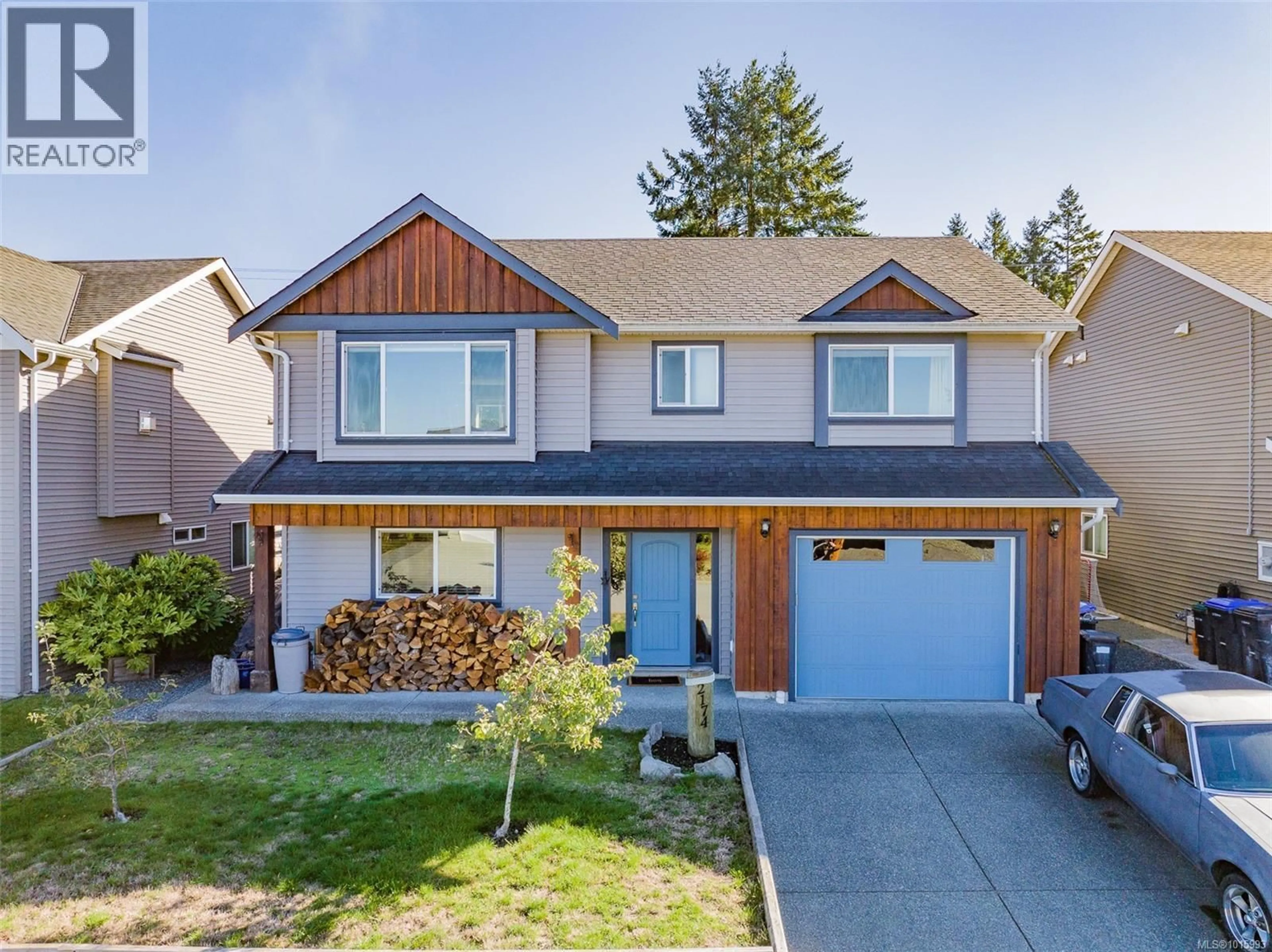 Home with vinyl exterior material, street for 2174 VILLAGE DRIVE, Nanaimo British Columbia V9X0A7