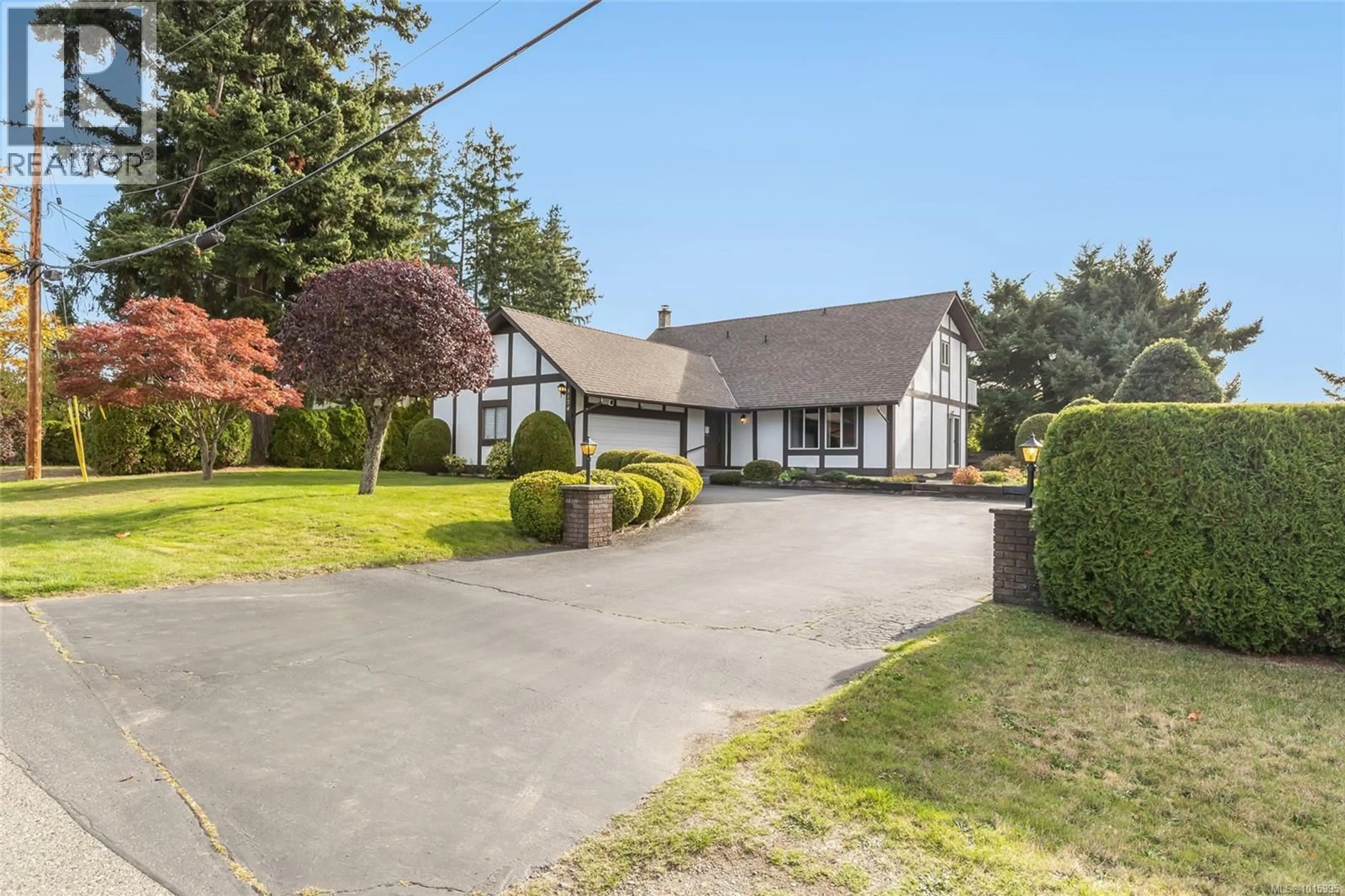 A pic from outside/outdoor area/front of a property/back of a property/a pic from drone, street for 5174 MAUREEN WAY, Nanaimo British Columbia V9T3Y2