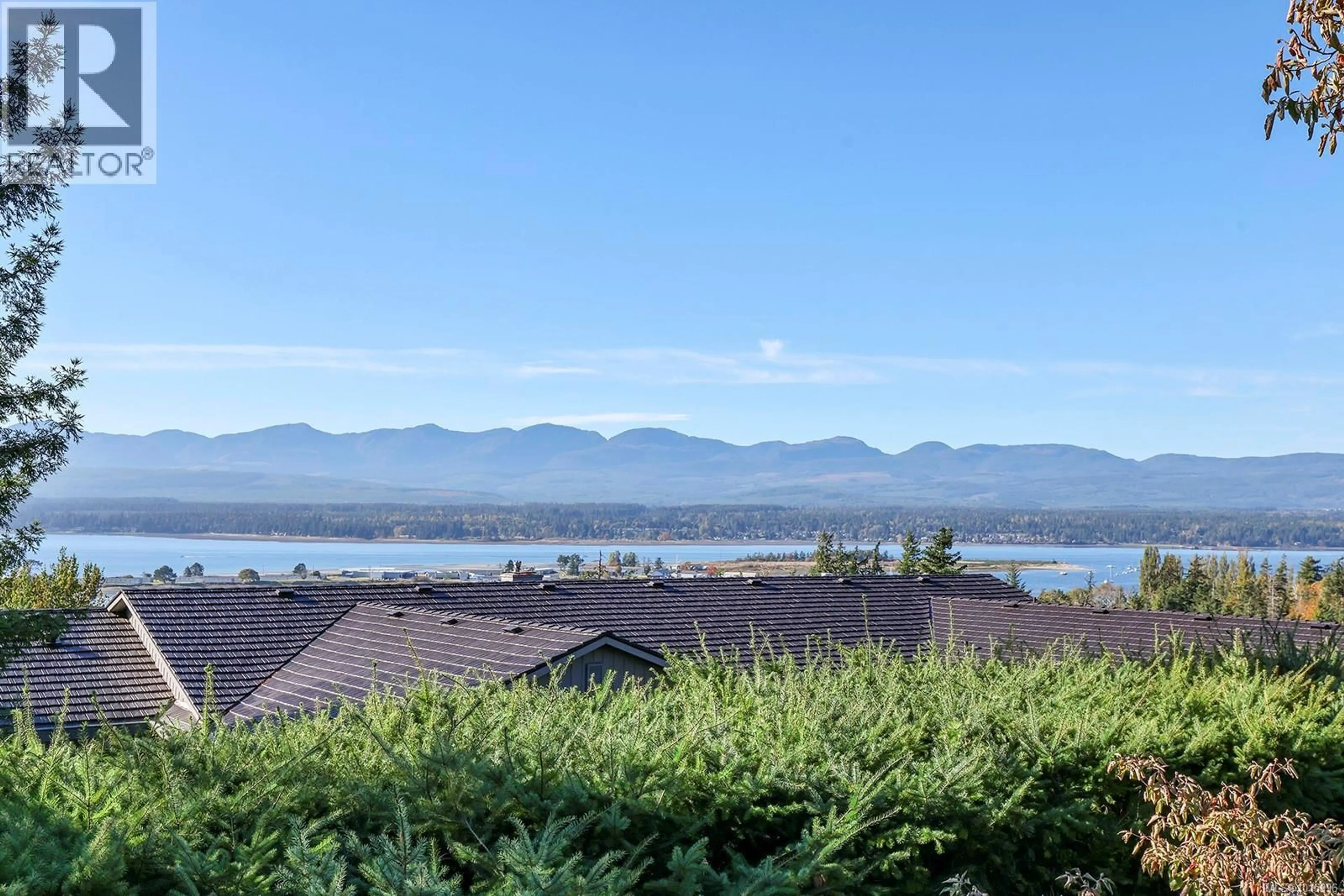 A pic from outside/outdoor area/front of a property/back of a property/a pic from drone, water/lake/river/ocean view for 1225 WALTER GAGE STREET, Comox British Columbia V9M3X1