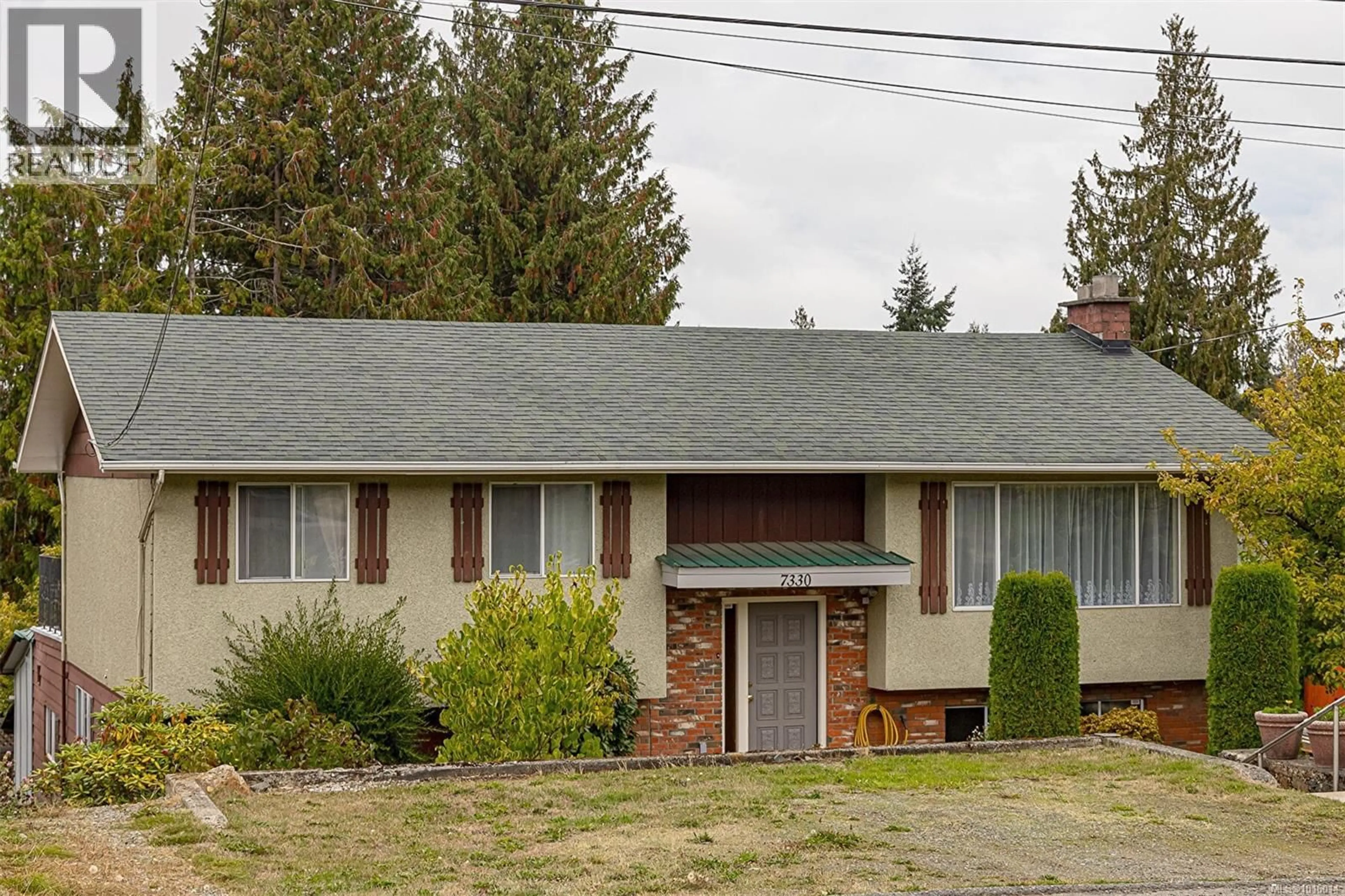 Home with vinyl exterior material, street for 7330 ROSSITER AVENUE SOUTHWEST, Lantzville British Columbia V0R2H0