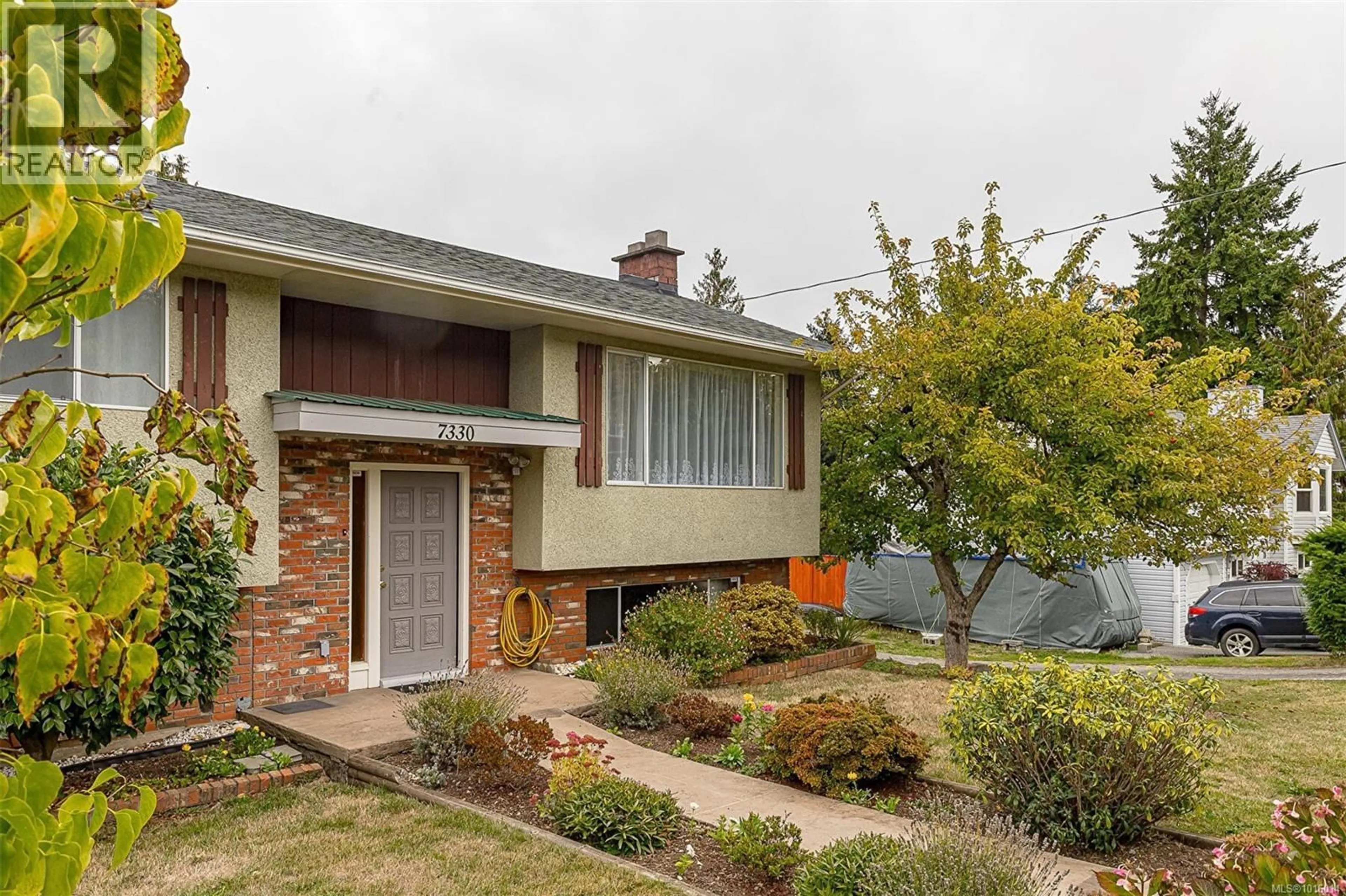 Home with brick exterior material, street for 7330 ROSSITER AVENUE SOUTHWEST, Lantzville British Columbia V0R2H0