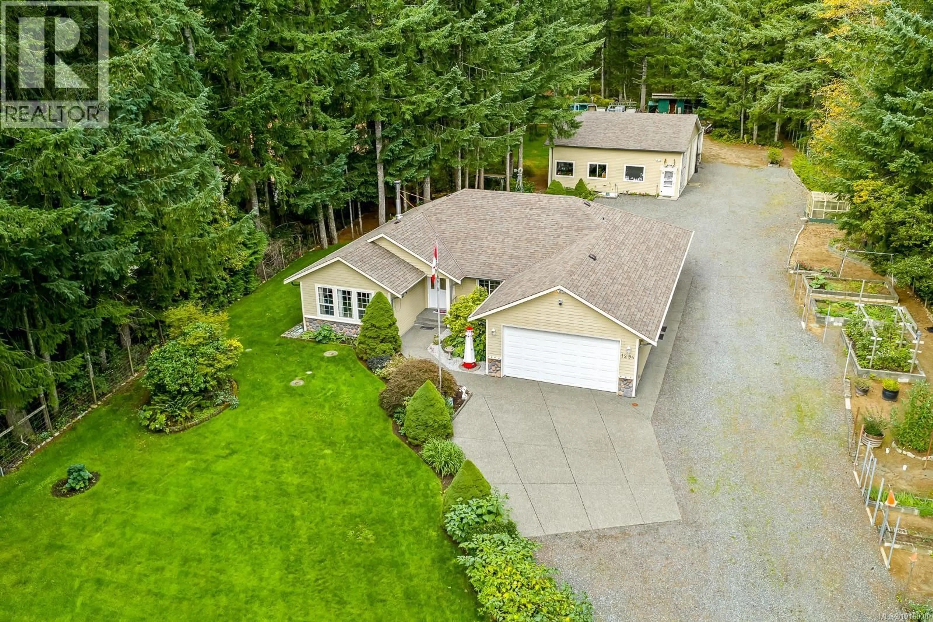 A pic from outside/outdoor area/front of a property/back of a property/a pic from drone, unknown for 1294 WILLIAMS BEACH ROAD, Black Creek British Columbia V0R2M0