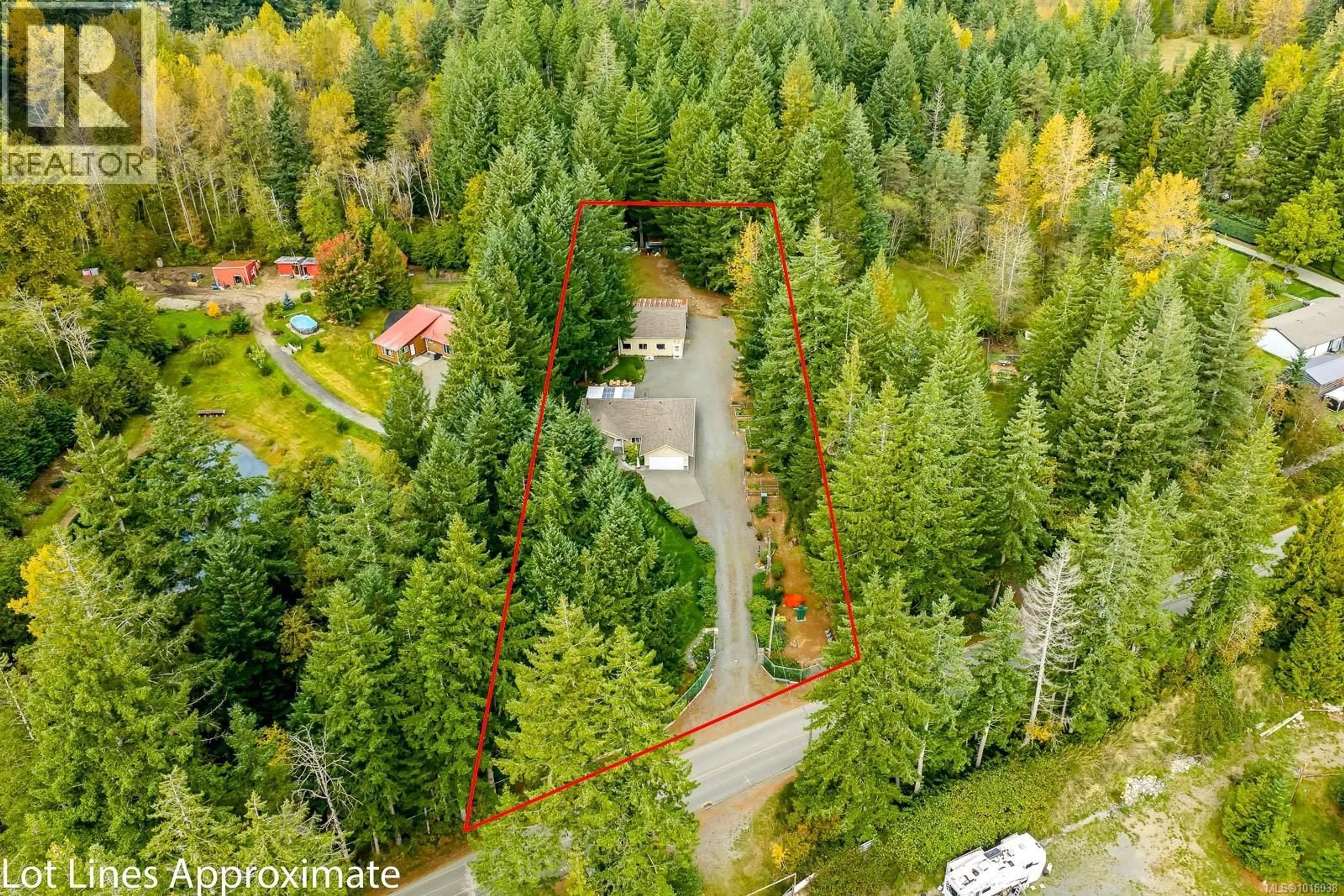 A pic from outside/outdoor area/front of a property/back of a property/a pic from drone, forest/trees view for 1294 WILLIAMS BEACH ROAD, Black Creek British Columbia V0R2M0