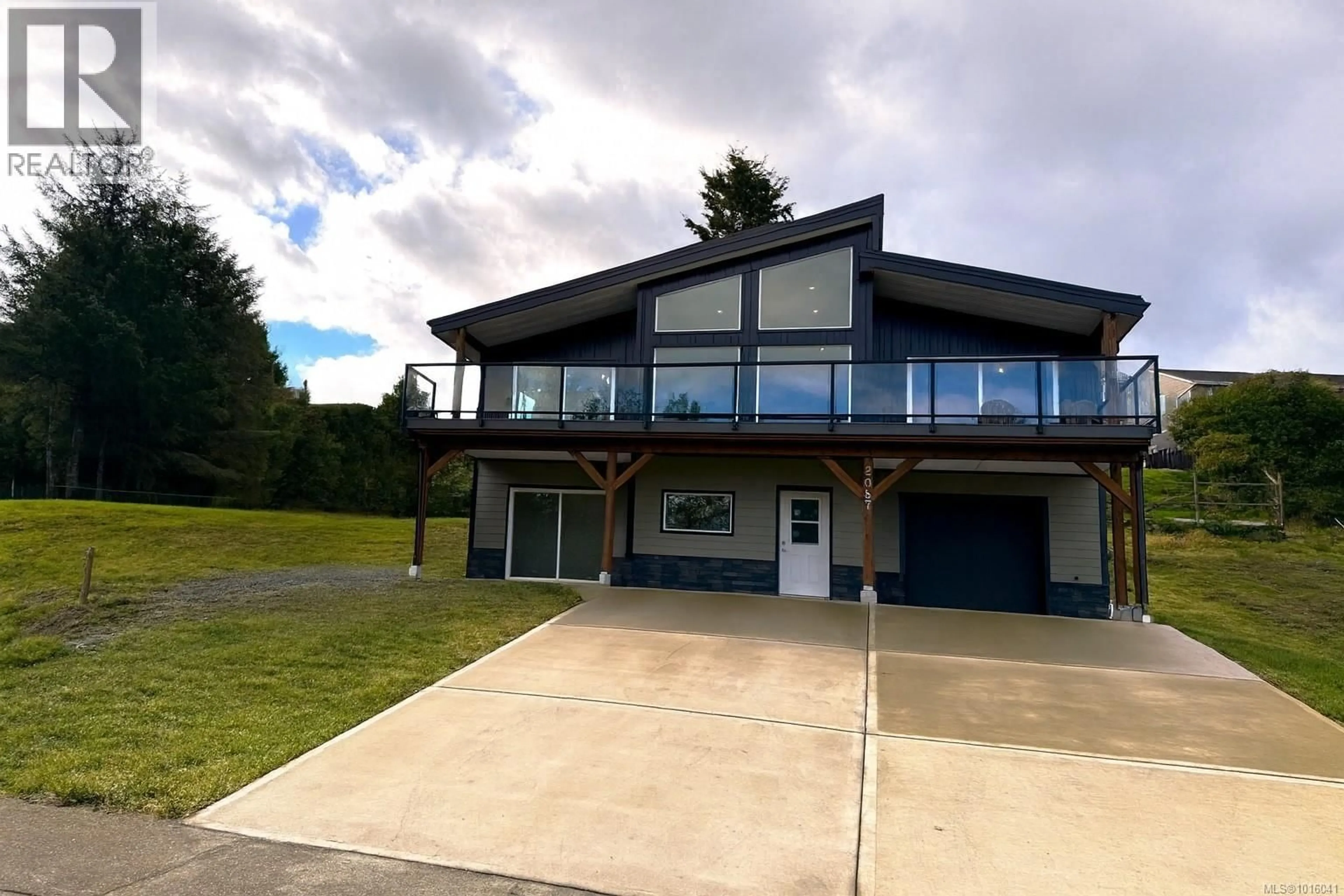 A pic from outside/outdoor area/front of a property/back of a property/a pic from drone, unknown for 2087 PIONEER HILL DRIVE, Port McNeill British Columbia V0N2R0