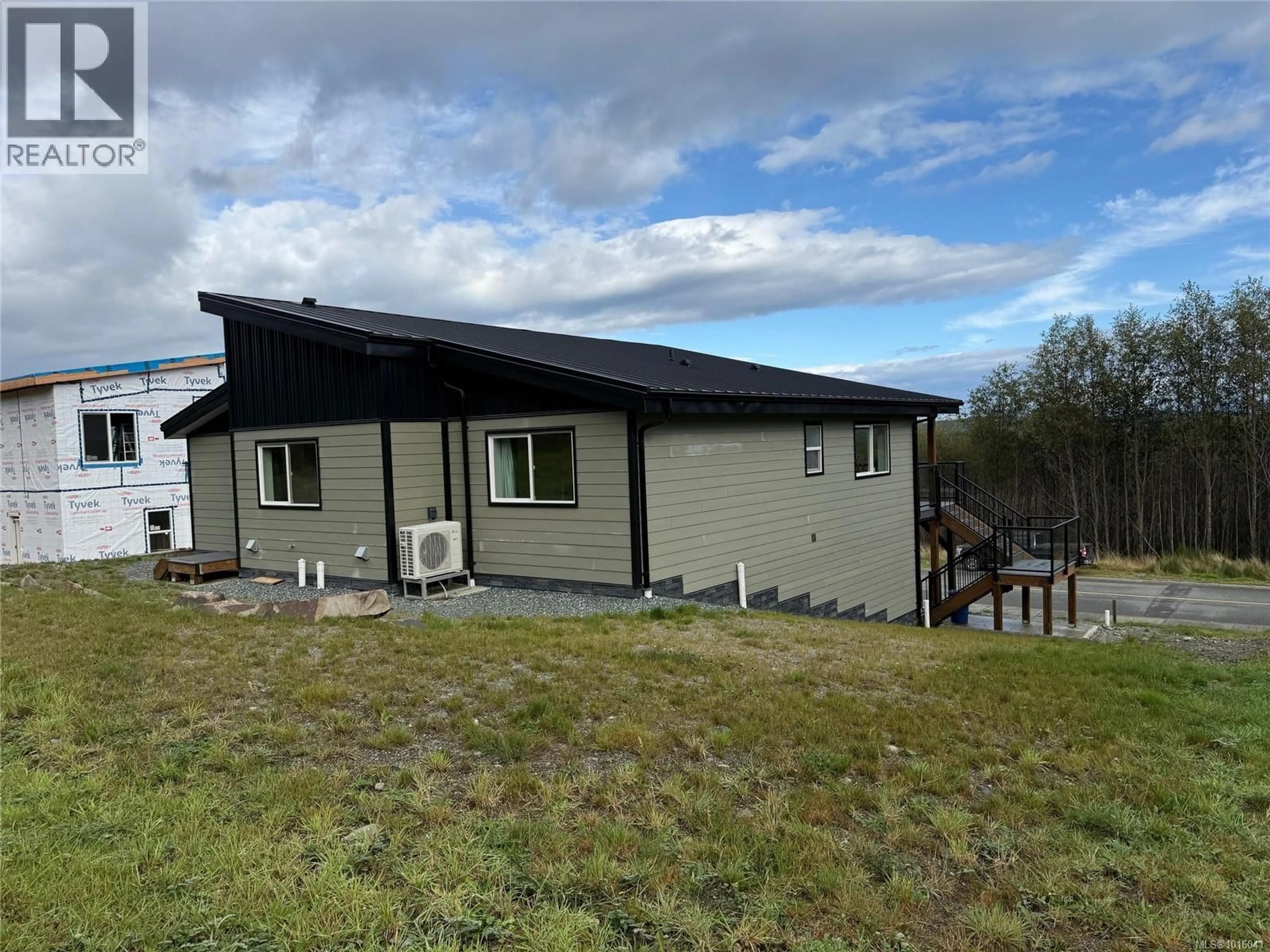 A pic from outside/outdoor area/front of a property/back of a property/a pic from drone, building for 2087 PIONEER HILL DRIVE, Port McNeill British Columbia V0N2R0
