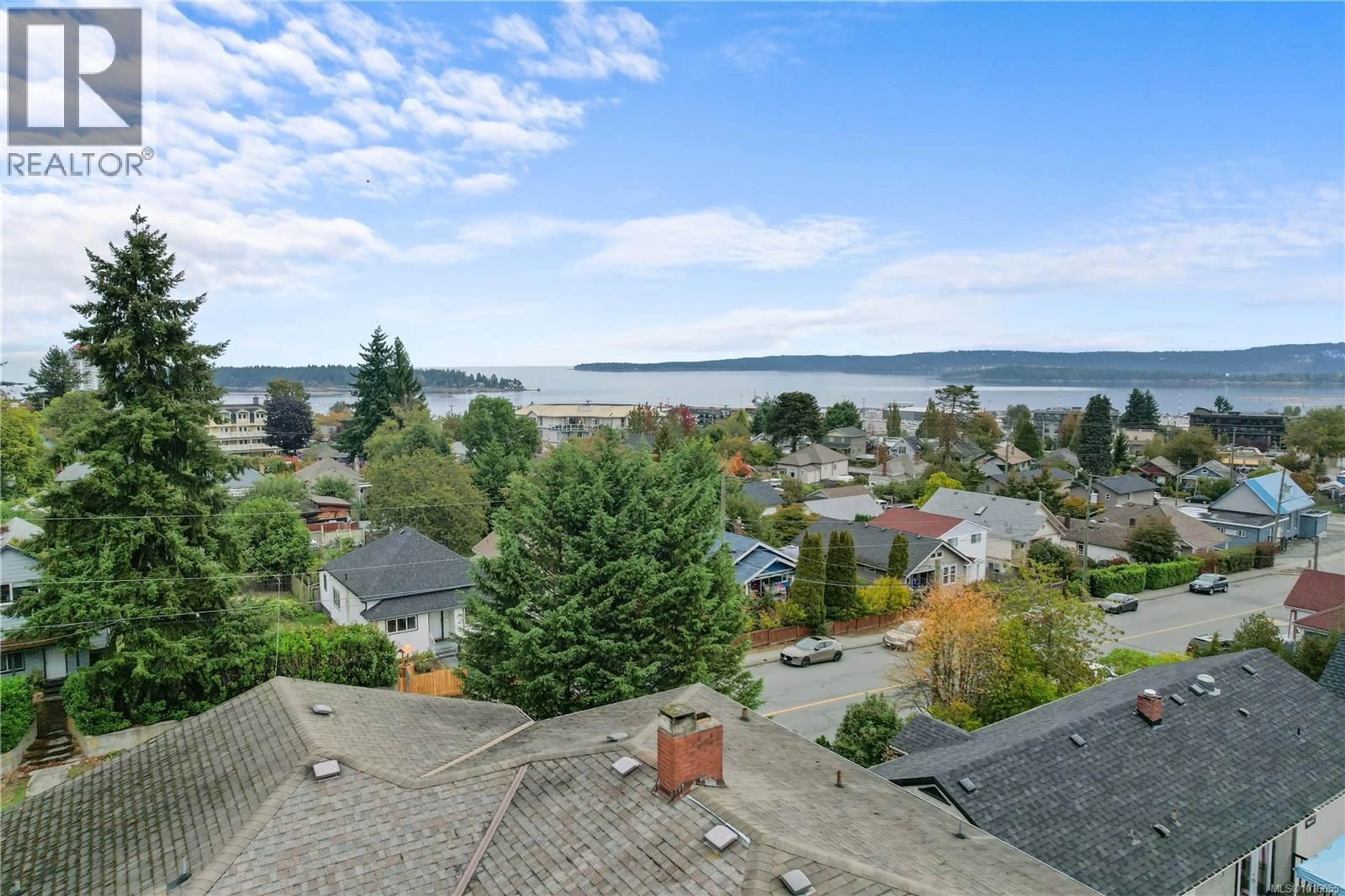 A pic from outside/outdoor area/front of a property/back of a property/a pic from drone, water/lake/river/ocean view for 609 MILTON STREET, Nanaimo British Columbia V9R2L4