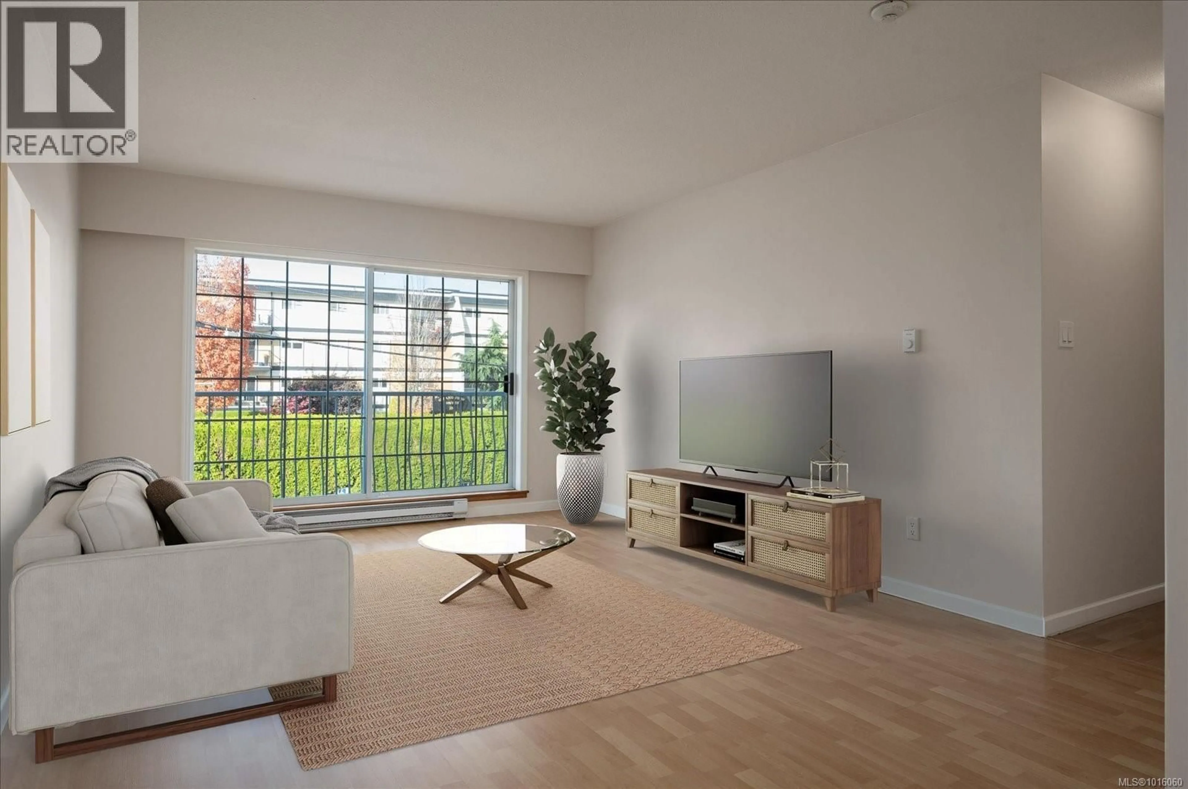 Living room with furniture, unknown for 204 - 266 HIRST AVENUE WEST, Parksville British Columbia V9P2K9