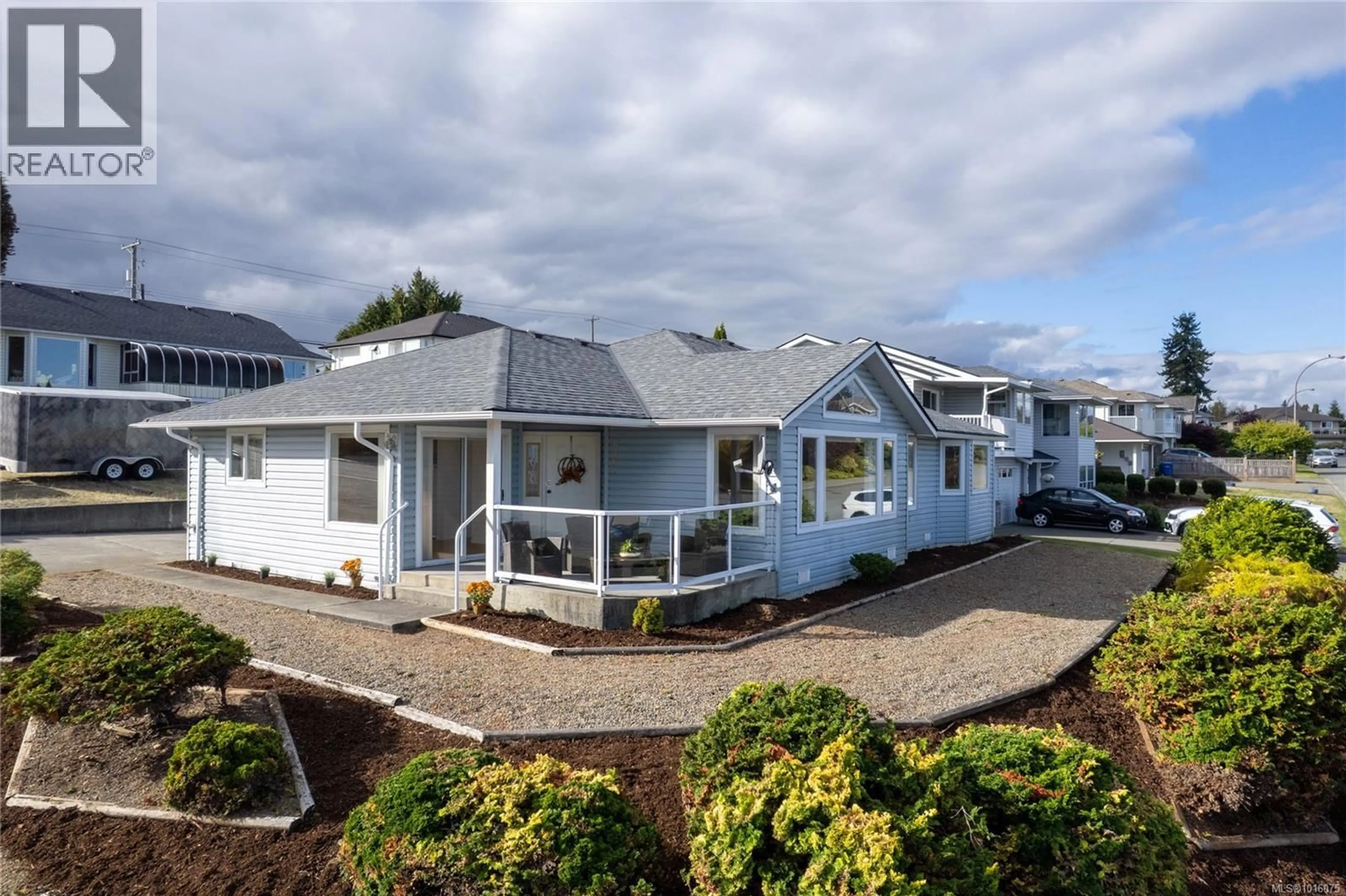 A pic from outside/outdoor area/front of a property/back of a property/a pic from drone, street for 6283 INVERMERE ROAD, Nanaimo British Columbia V9V1K9