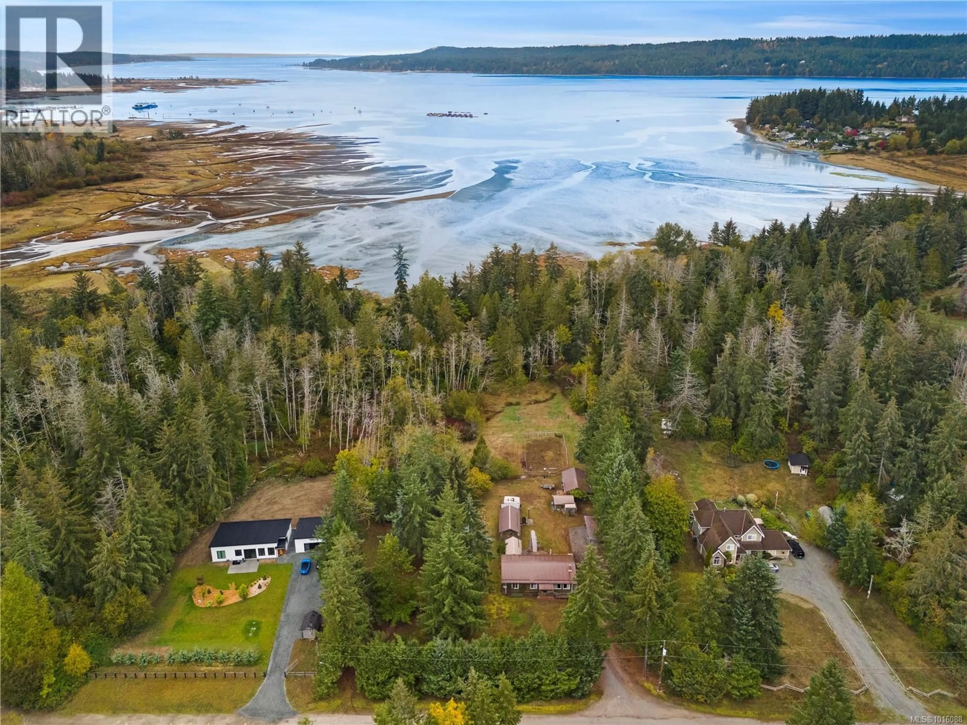 A pic from outside/outdoor area/front of a property/back of a property/a pic from drone, water/lake/river/ocean view for 372 BATES DRIVE, Fanny Bay British Columbia V0R1W0