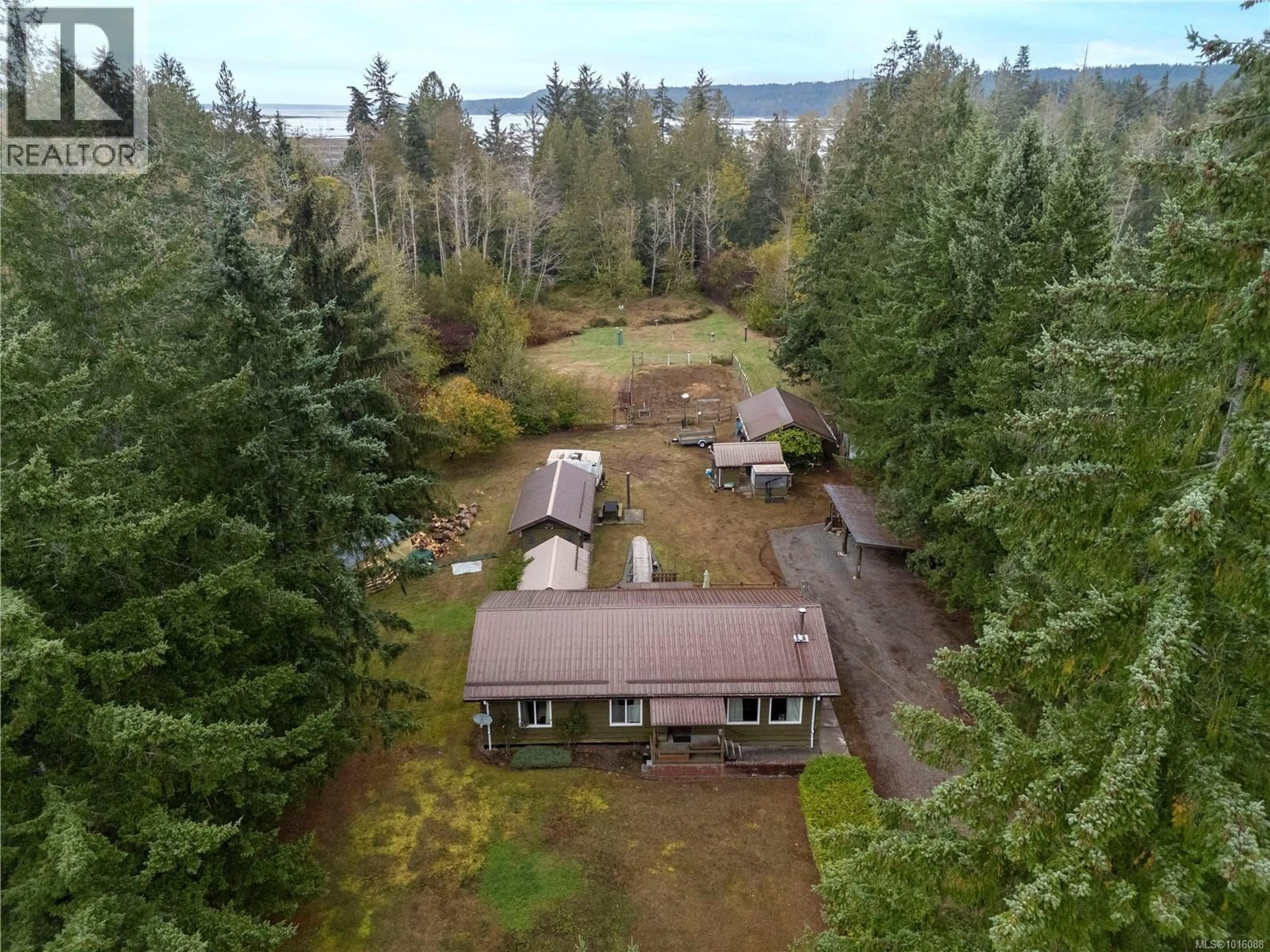 A pic from outside/outdoor area/front of a property/back of a property/a pic from drone, water/lake/river/ocean view for 372 BATES DRIVE, Fanny Bay British Columbia V0R1W0