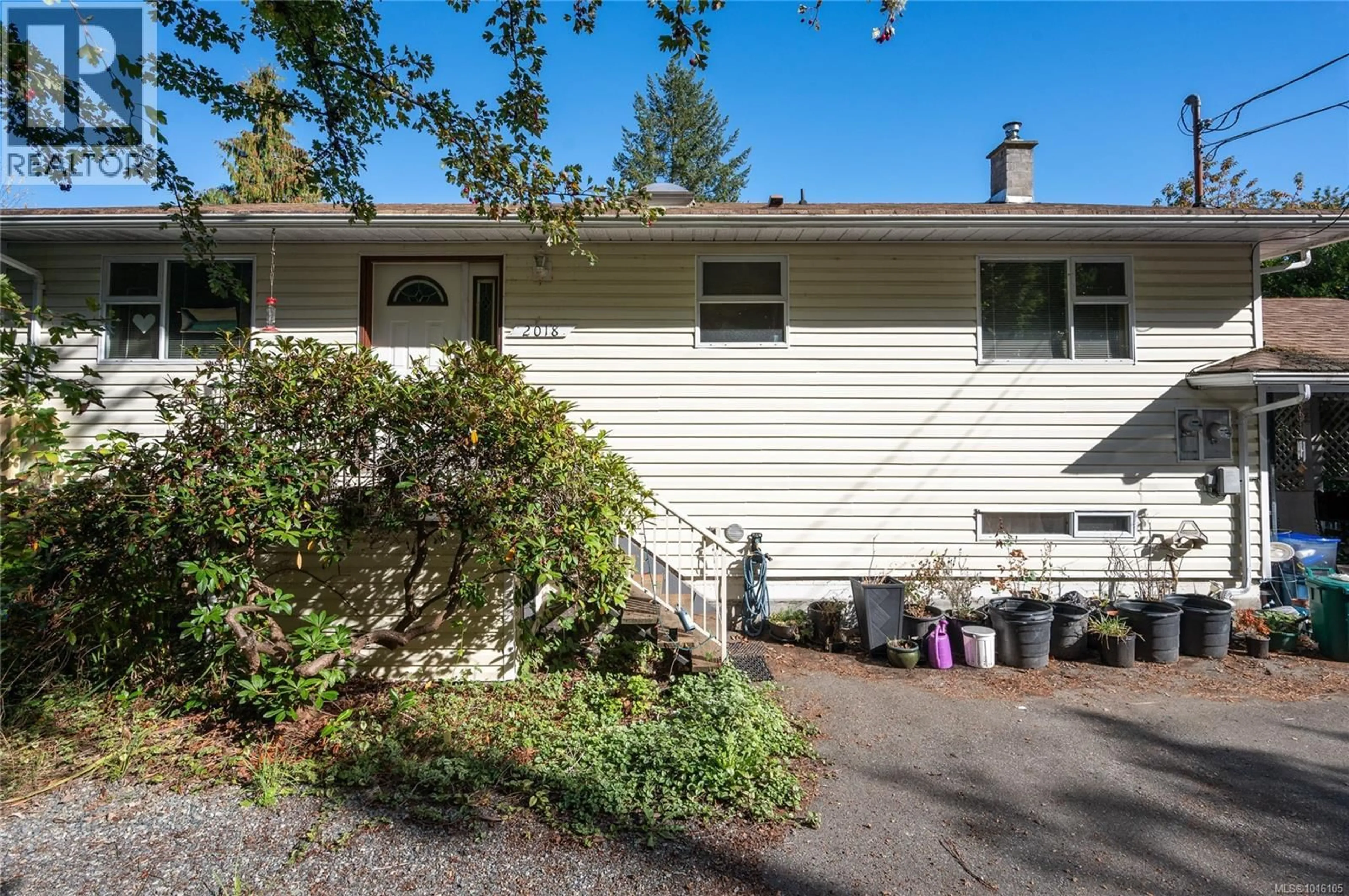 Home with vinyl exterior material, street for 2018 CINNABAR AVENUE, Nanaimo British Columbia V9X1B3