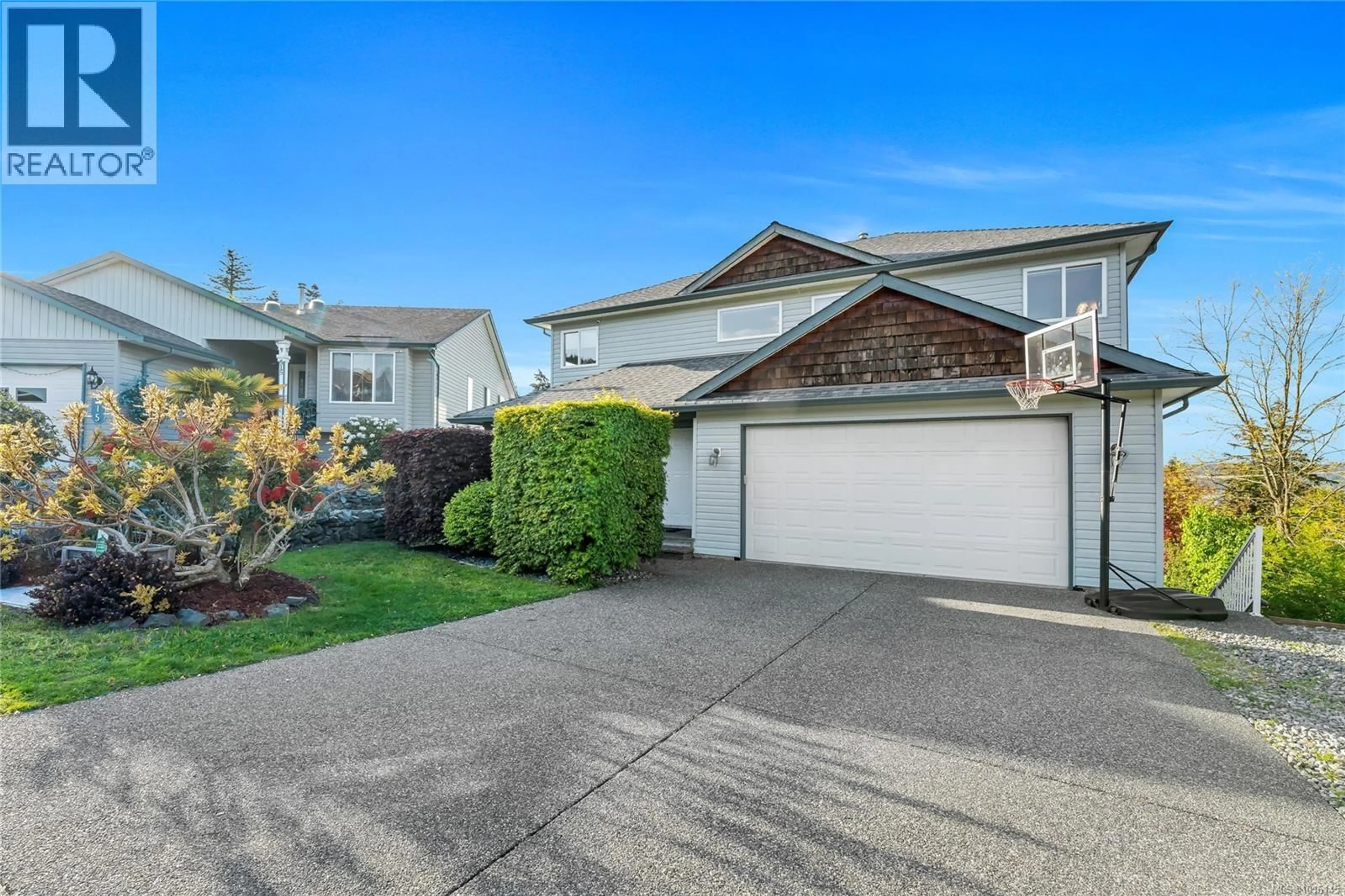 Home with vinyl exterior material, street for 517 LOUISE ROAD, Ladysmith British Columbia V9G1W7