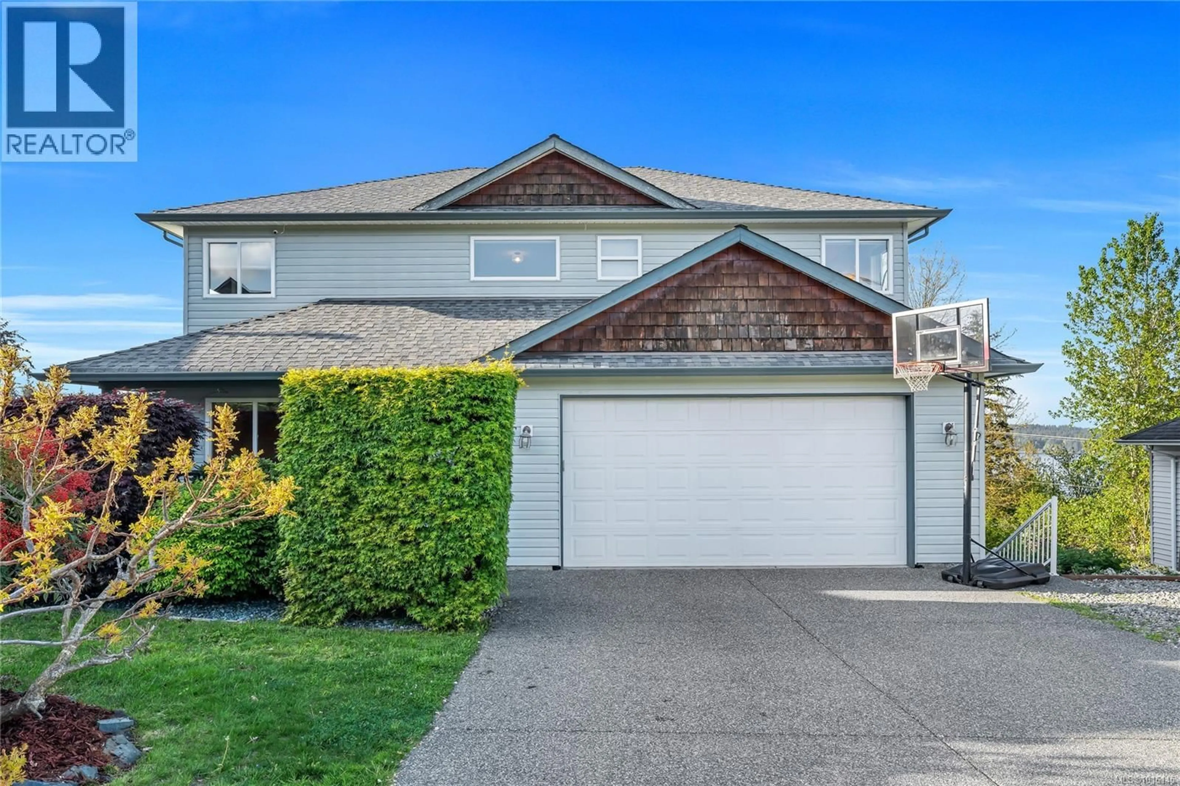 Home with vinyl exterior material, street for 517 LOUISE ROAD, Ladysmith British Columbia V9G1W7