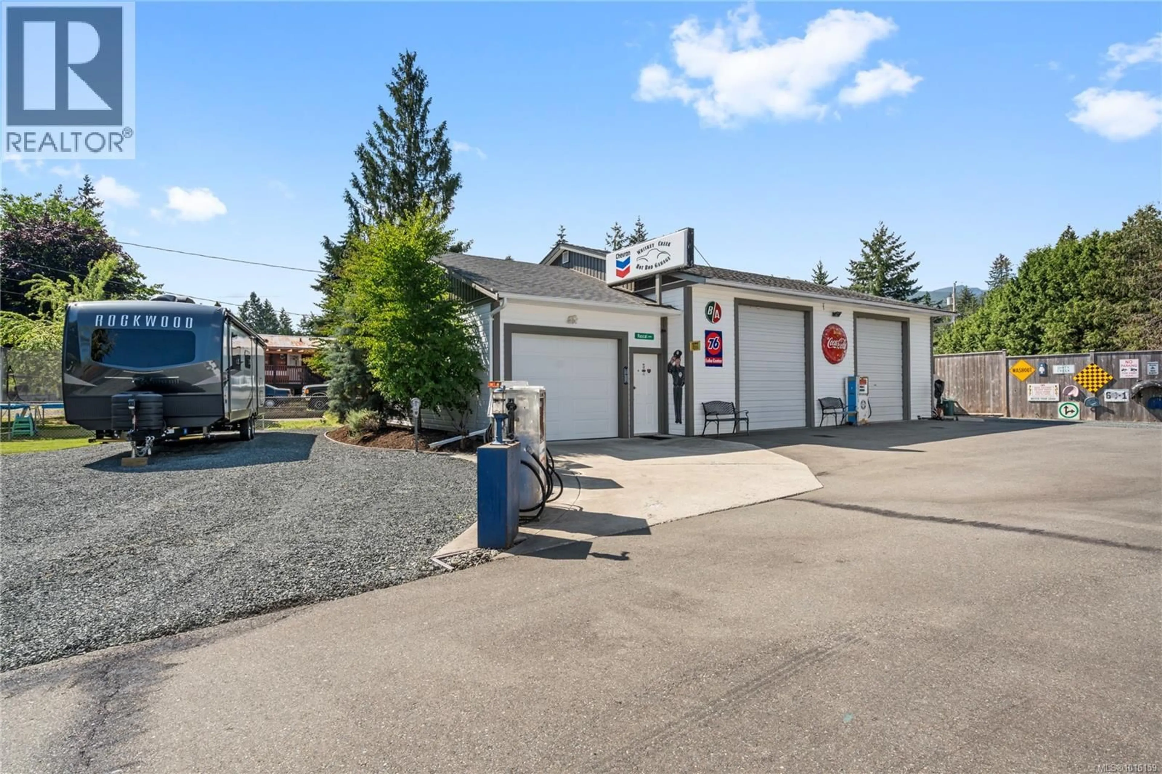 A pic from outside/outdoor area/front of a property/back of a property/a pic from drone, street for 911 POPLAR WAY, Hilliers British Columbia V9K1V8