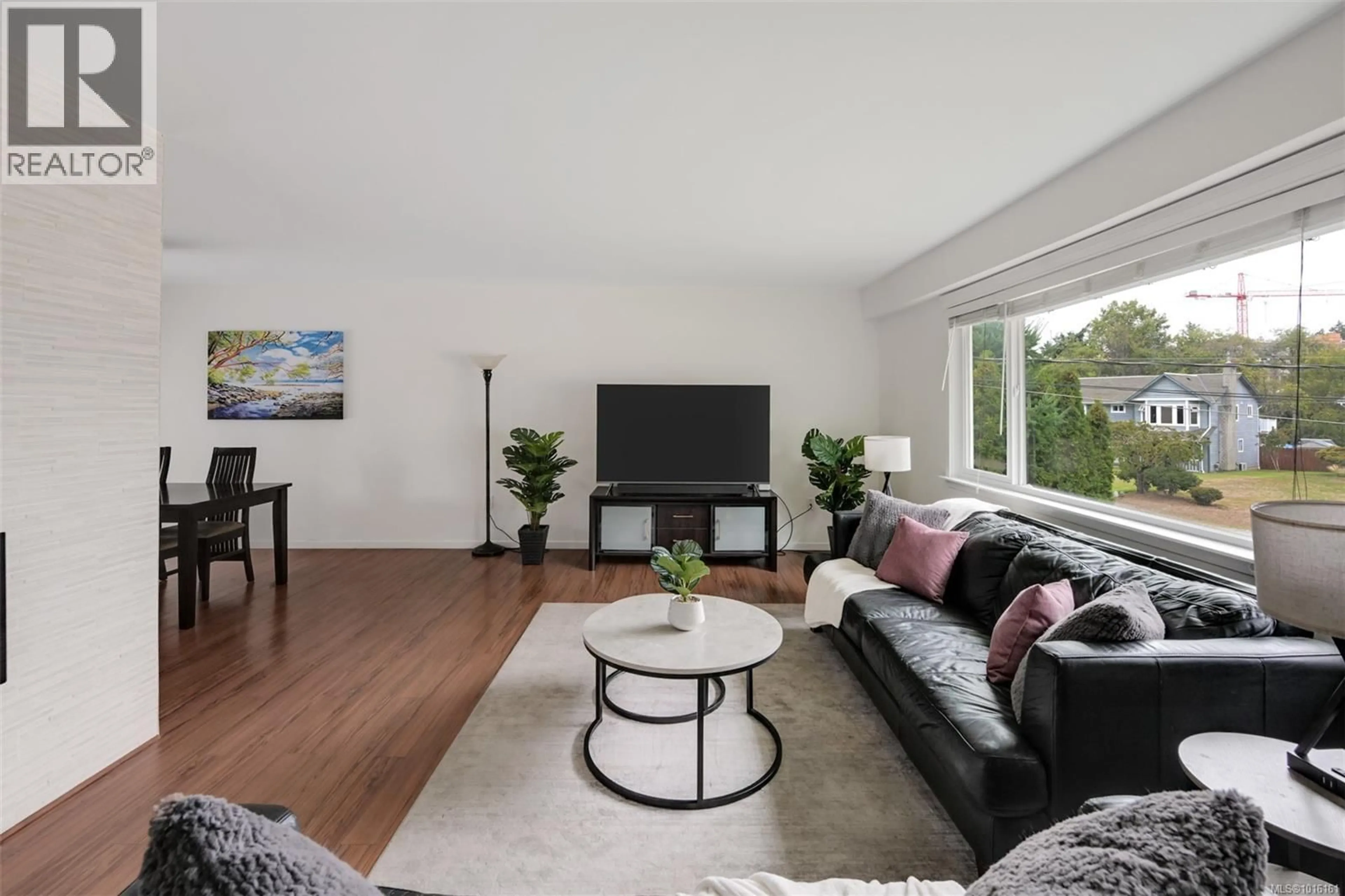 Living room with furniture, wood/laminate floor for 2874 PICKFORD ROAD, Colwood British Columbia V9B4N2