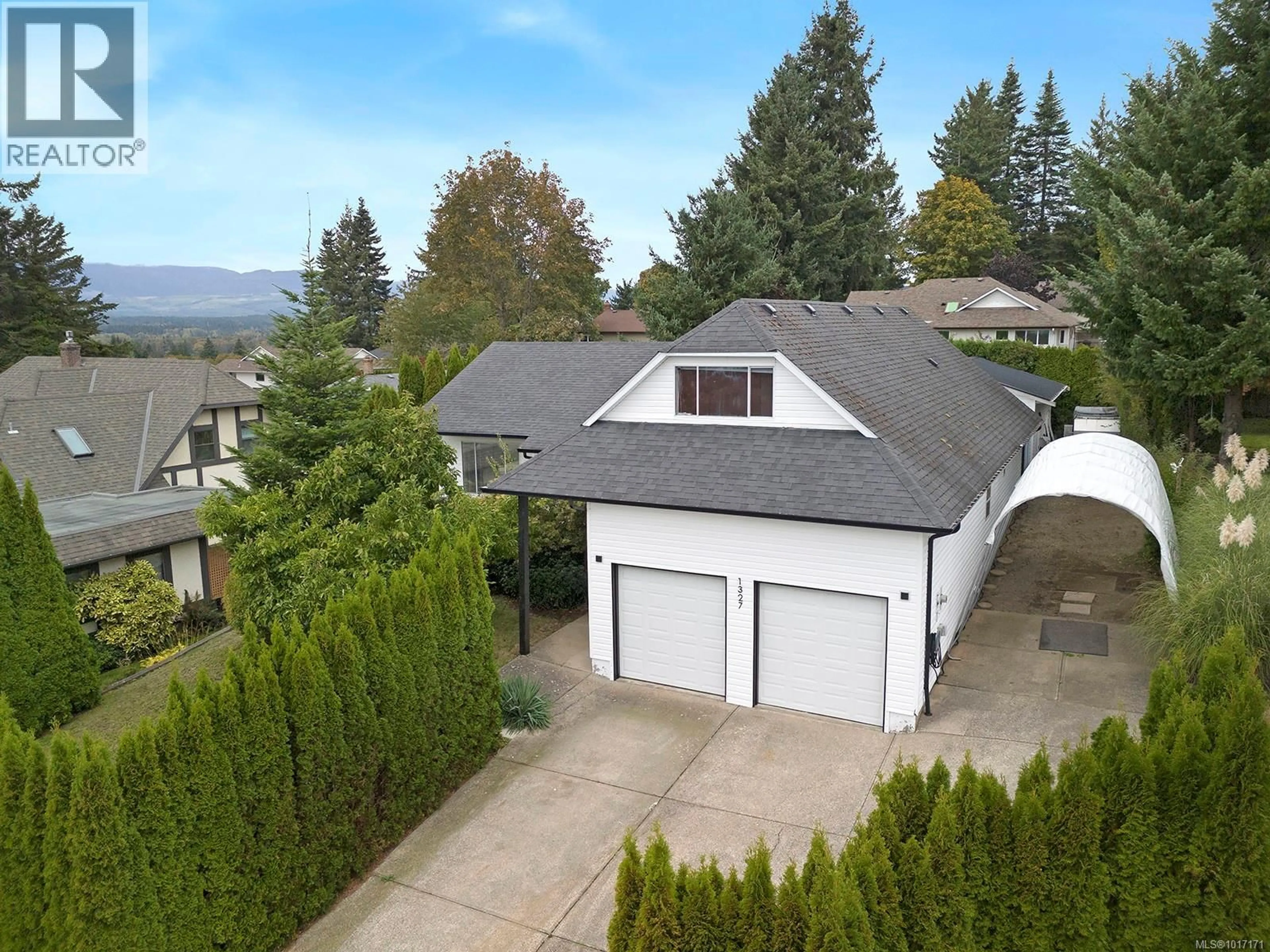 A pic from outside/outdoor area/front of a property/back of a property/a pic from drone, mountain view for 1327 MALAHAT DRIVE, Courtenay British Columbia V9N8B2