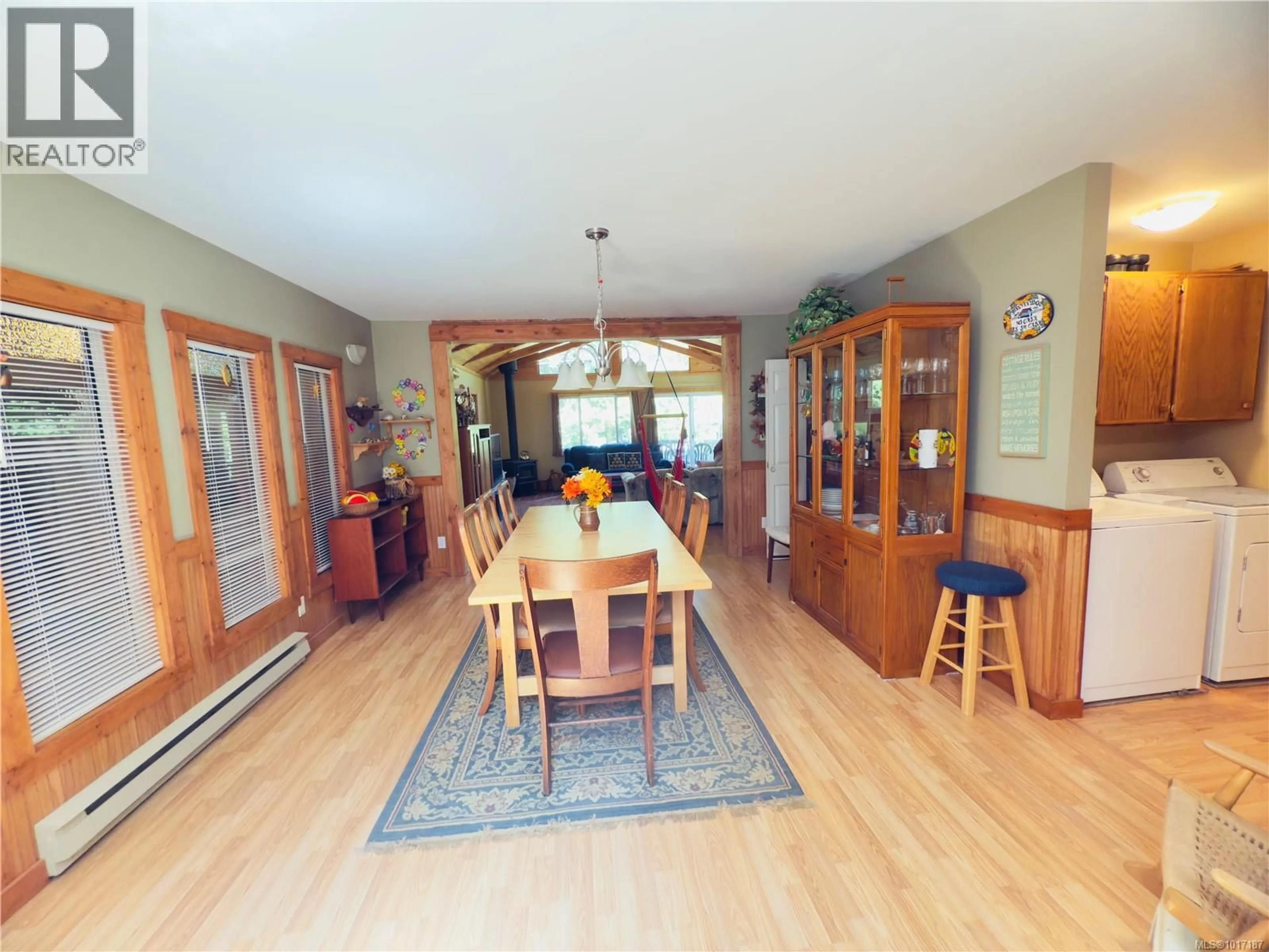 Dining room, wood/laminate floor for 667 WEATHERS WAY, Mudge Island British Columbia V0R1X6