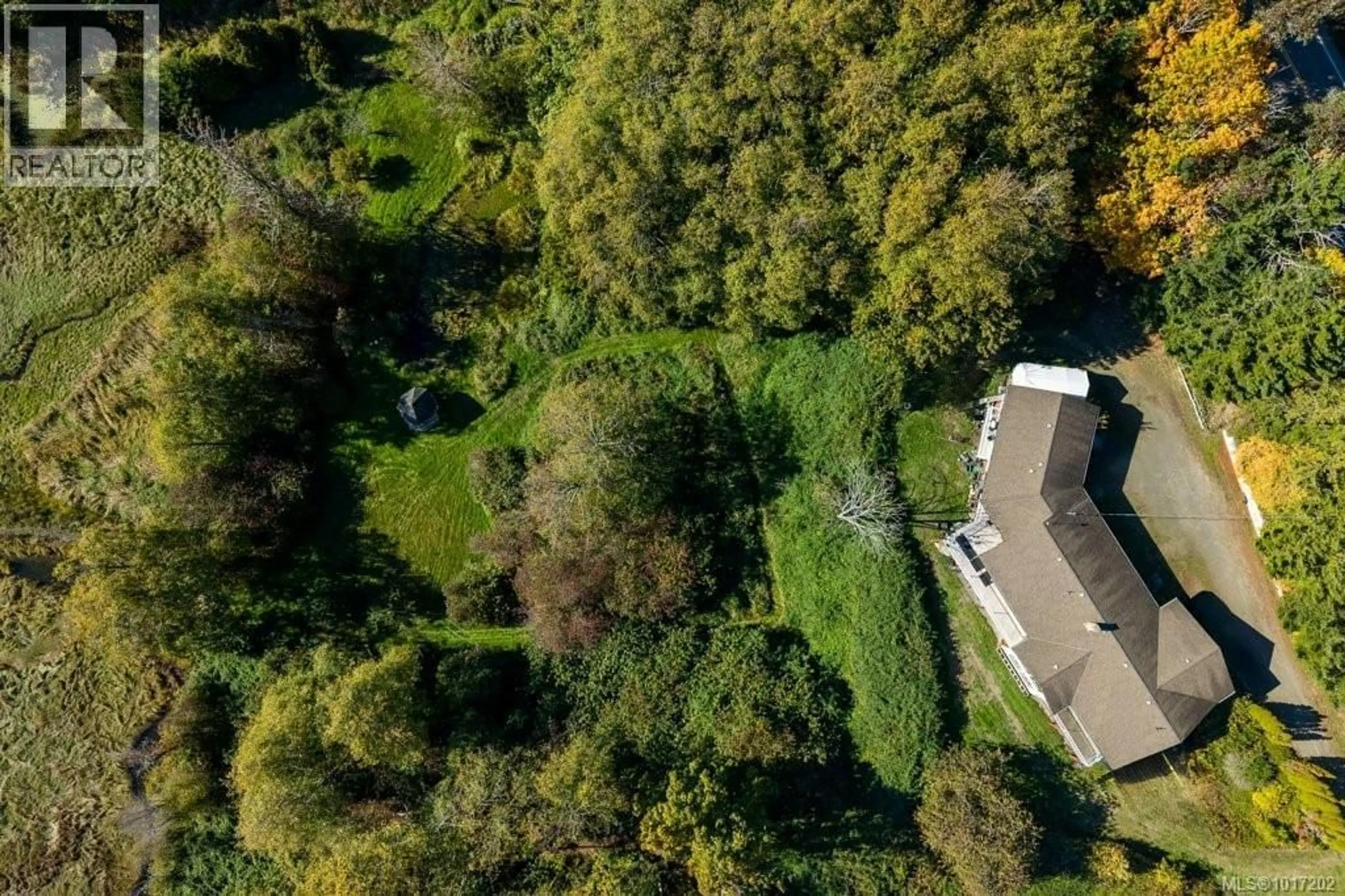 A pic from outside/outdoor area/front of a property/back of a property/a pic from drone, forest/trees view for 2983 NORTHWEST BAY ROAD, Nanoose Bay British Columbia V9P9J9