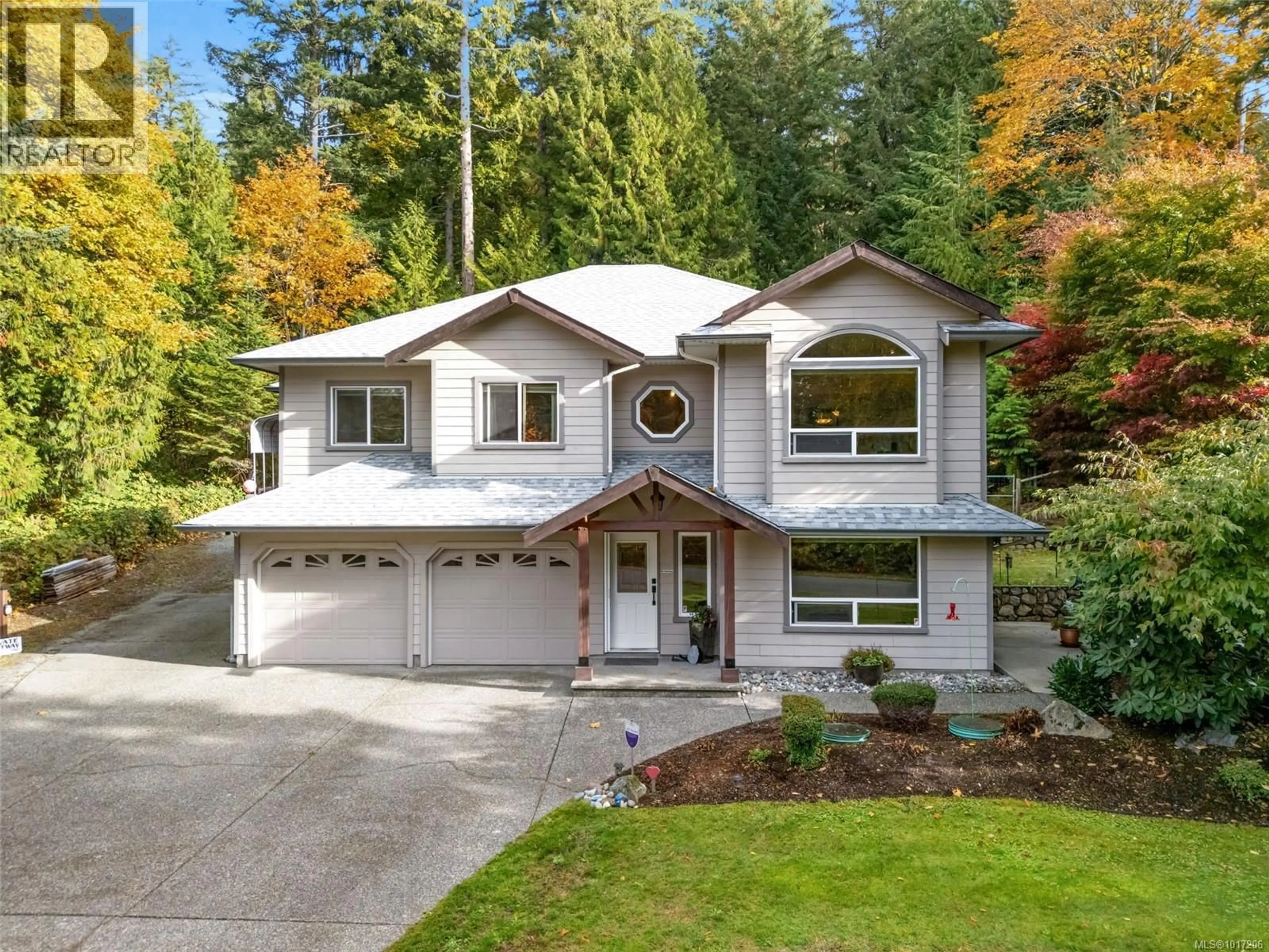 Home with vinyl exterior material, street for 1193 GARDEN GATE DRIVE, Central Saanich British Columbia V8M2H6