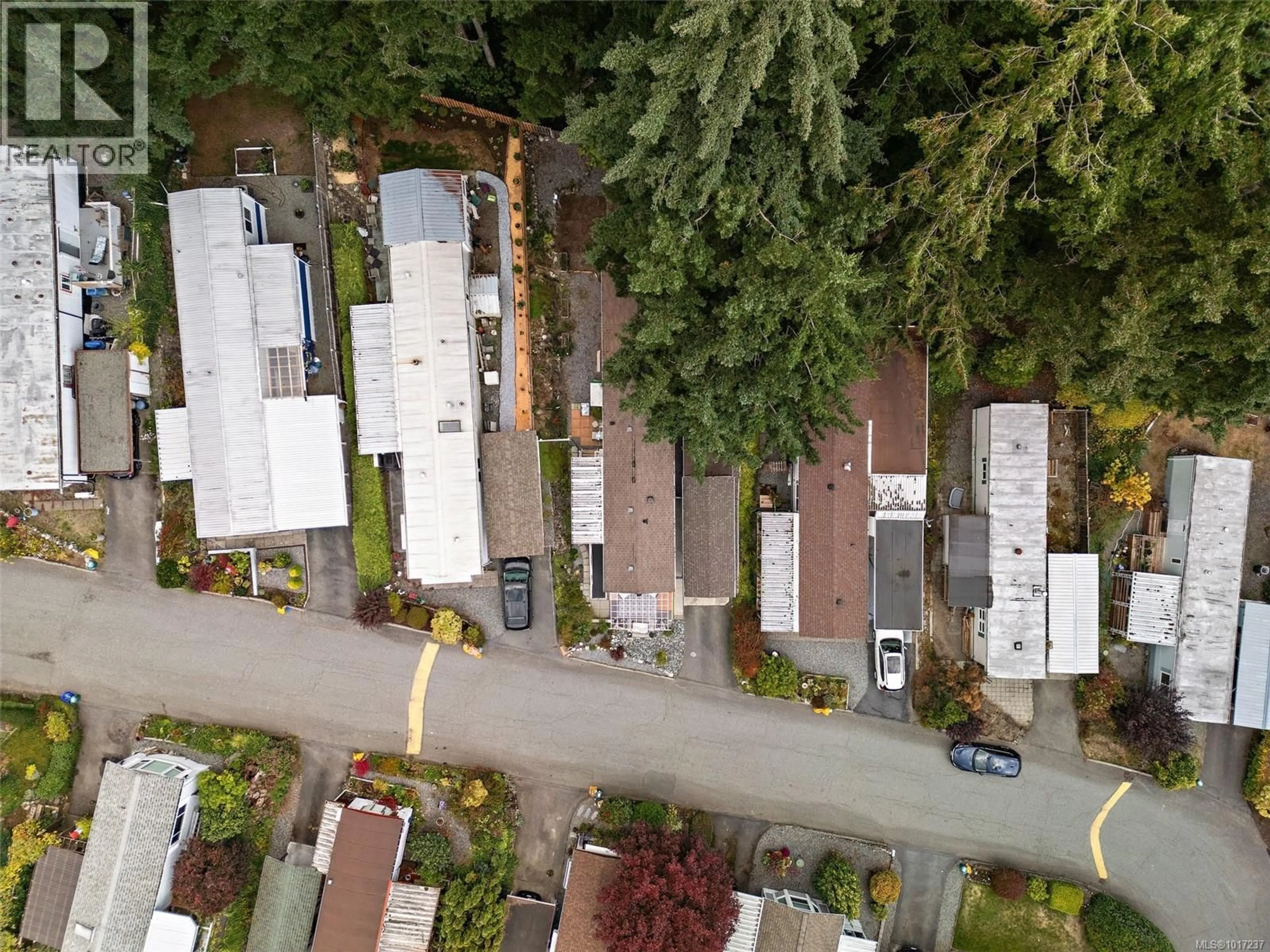 A pic from outside/outdoor area/front of a property/back of a property/a pic from drone, street for 72 - 10980 WESTDOWNE ROAD, Ladysmith British Columbia