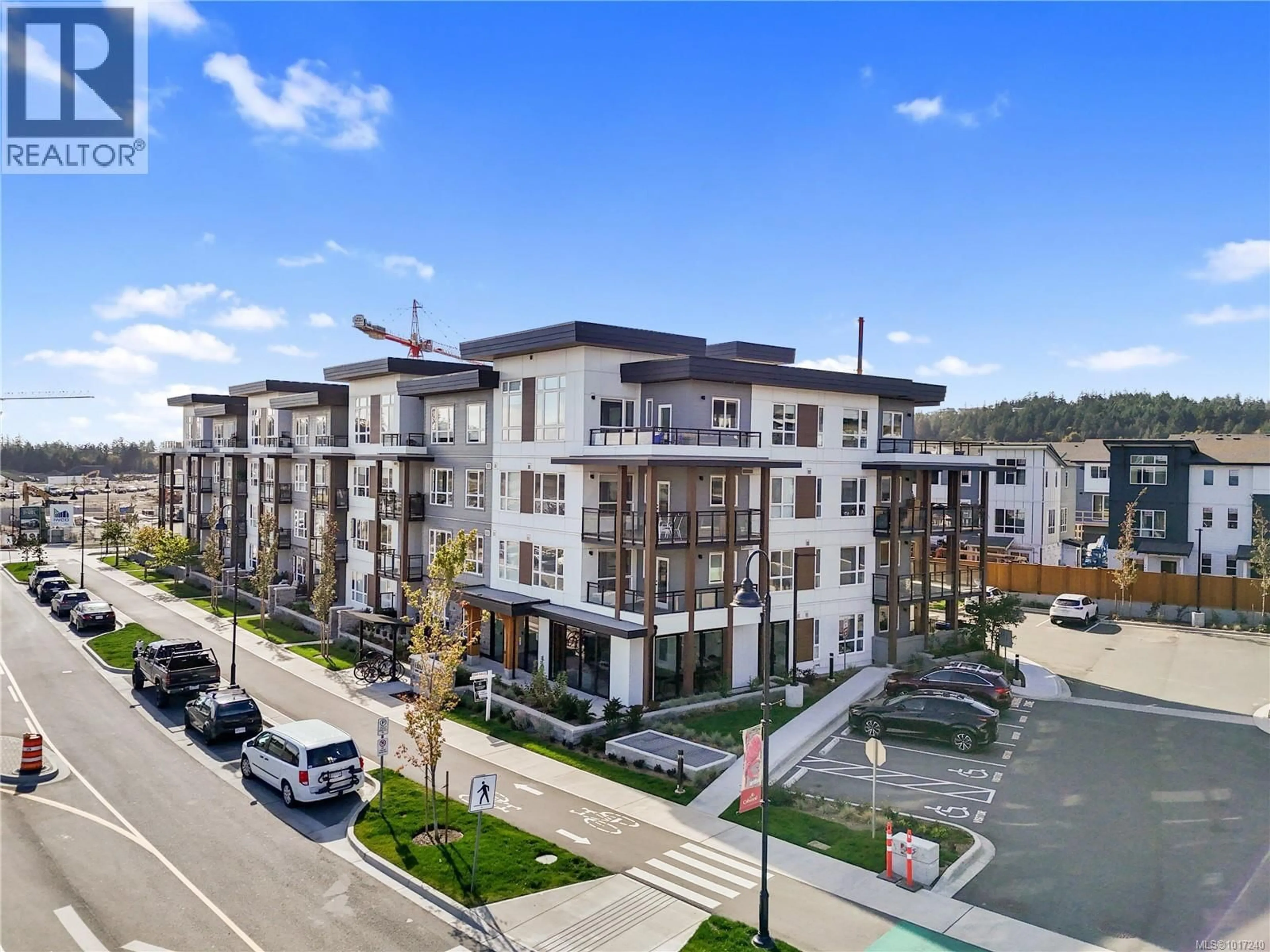 A pic from outside/outdoor area/front of a property/back of a property/a pic from drone, mountain view for 308 - 3564B RYDER HESJEDAL WAY, Colwood British Columbia V9C0V4