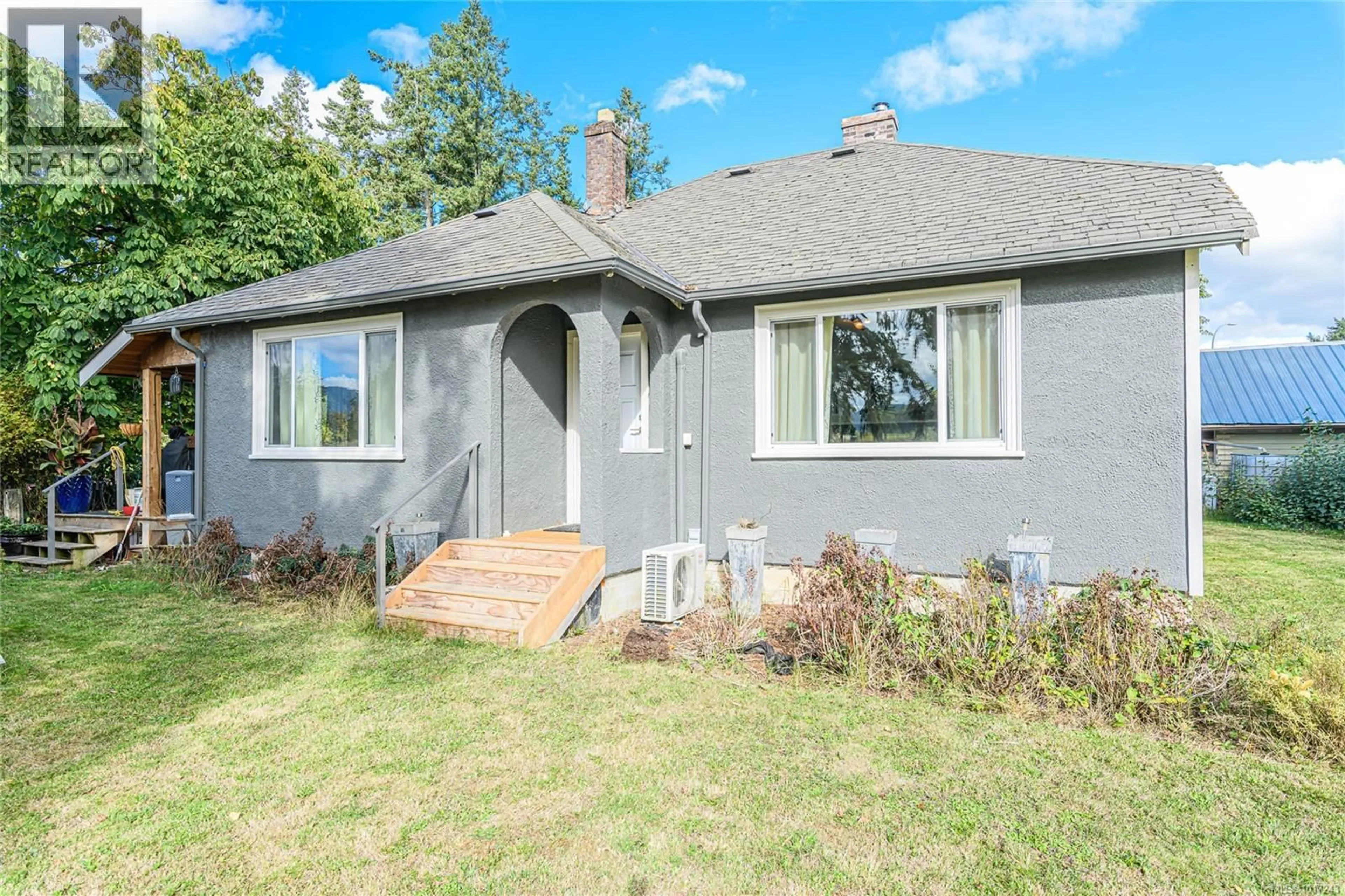 Home with vinyl exterior material, street for 2200 PHIPPS ROAD, Duncan British Columbia V9L6L2