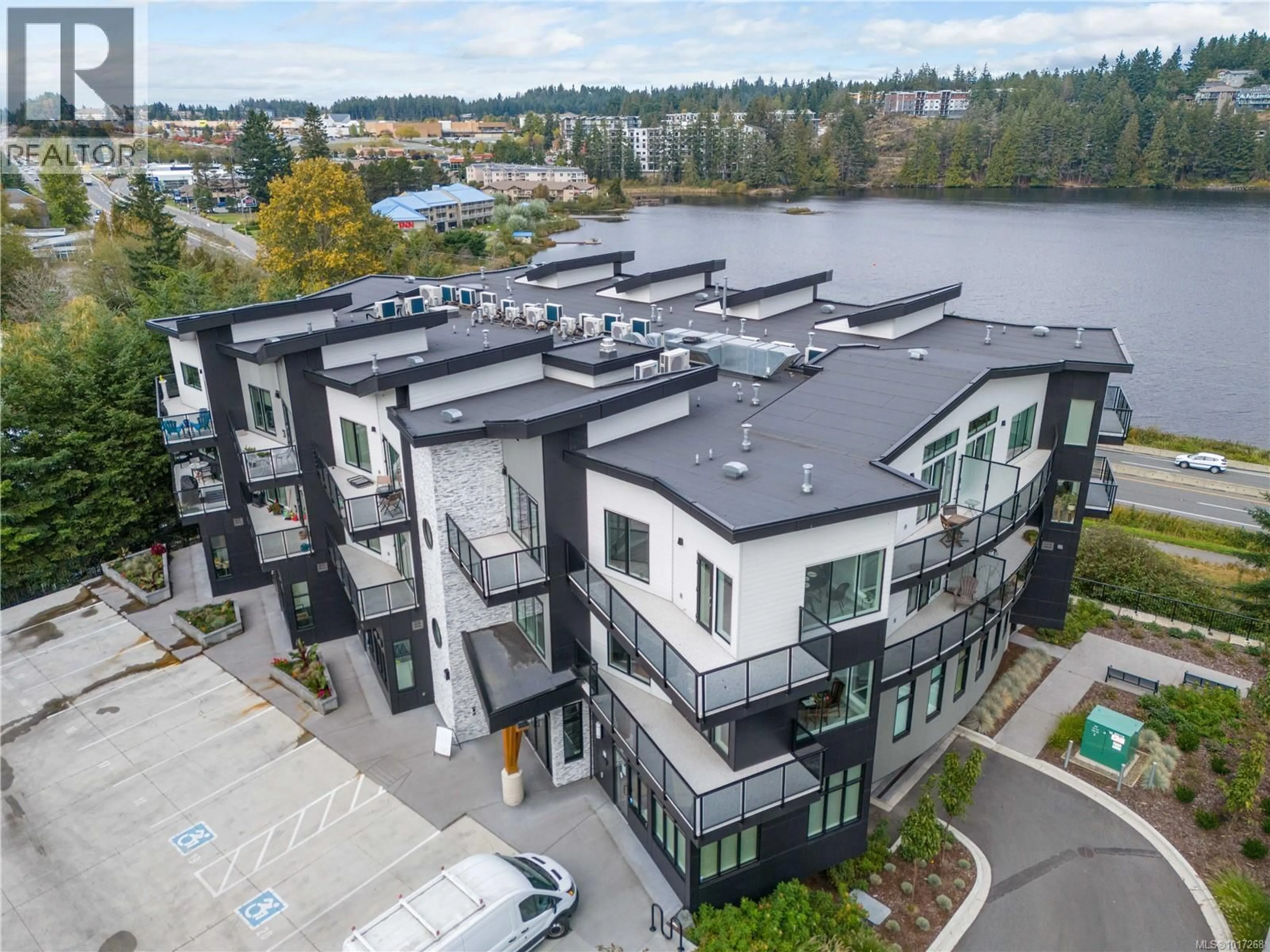 A pic from outside/outdoor area/front of a property/back of a property/a pic from drone, water/lake/river/ocean view for 206 - 4474 WELLINGTON ROAD, Nanaimo British Columbia V9T2H3