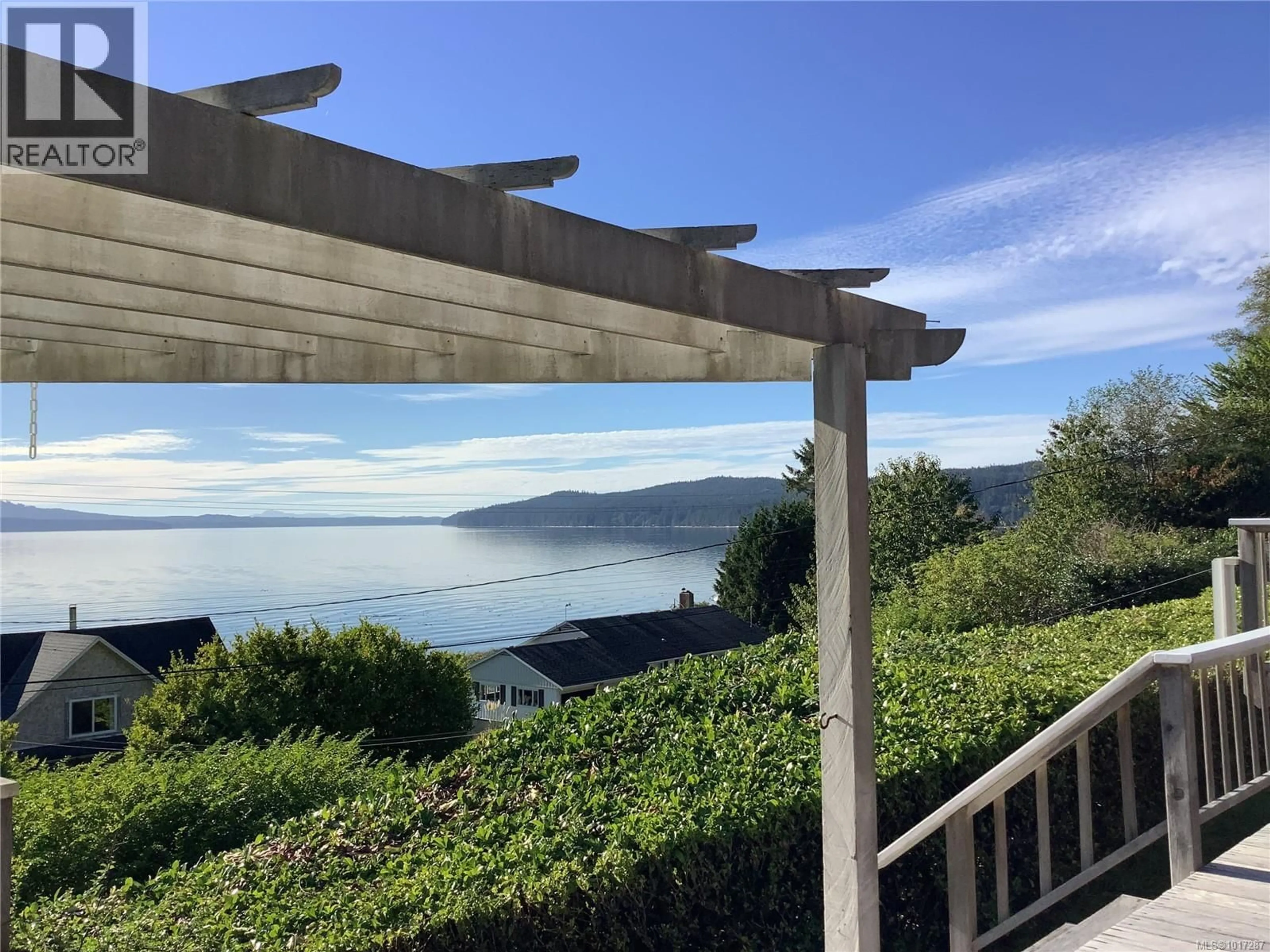 A pic from outside/outdoor area/front of a property/back of a property/a pic from drone, water/lake/river/ocean view for 110 10TH AVENUE, Sointula British Columbia V0N3E0