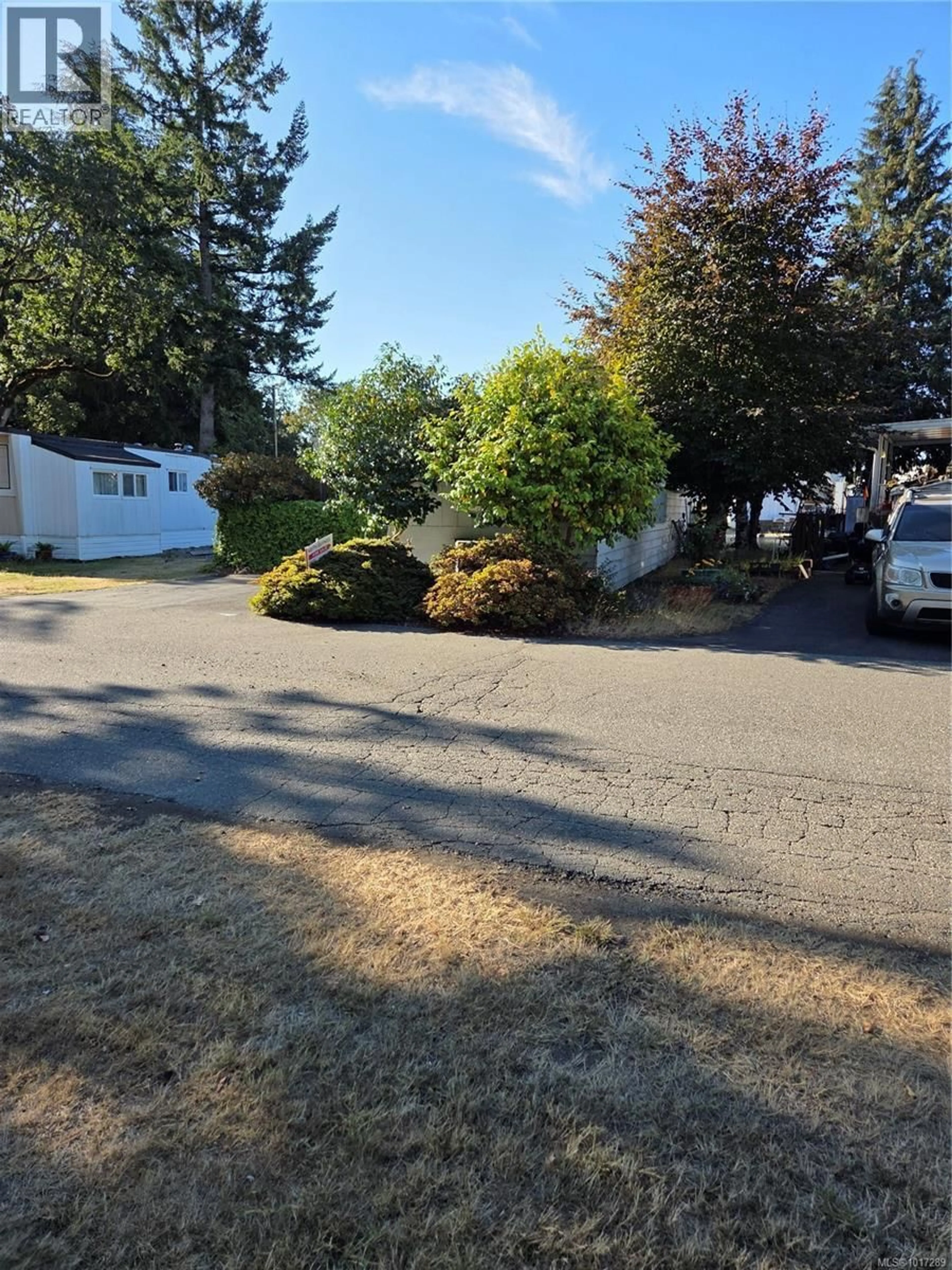 A pic from outside/outdoor area/front of a property/back of a property/a pic from drone, street for 57 - 2780 SPENCER ROAD, Langford British Columbia V9B4C9
