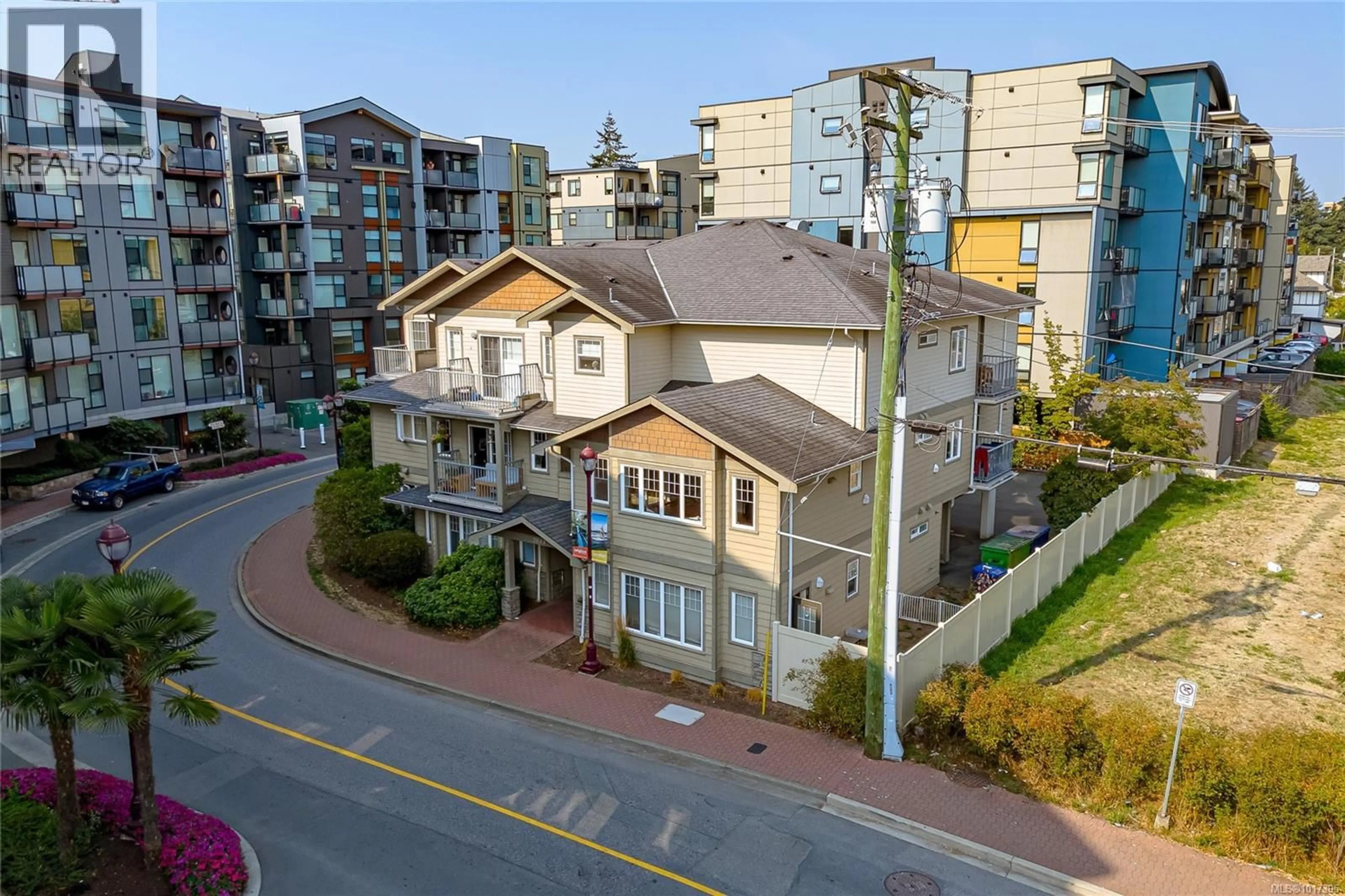 A pic from outside/outdoor area/front of a property/back of a property/a pic from drone, city buildings view from balcony for 203 - 2844 BRYN MAUR ROAD, Langford British Columbia L1L1L1