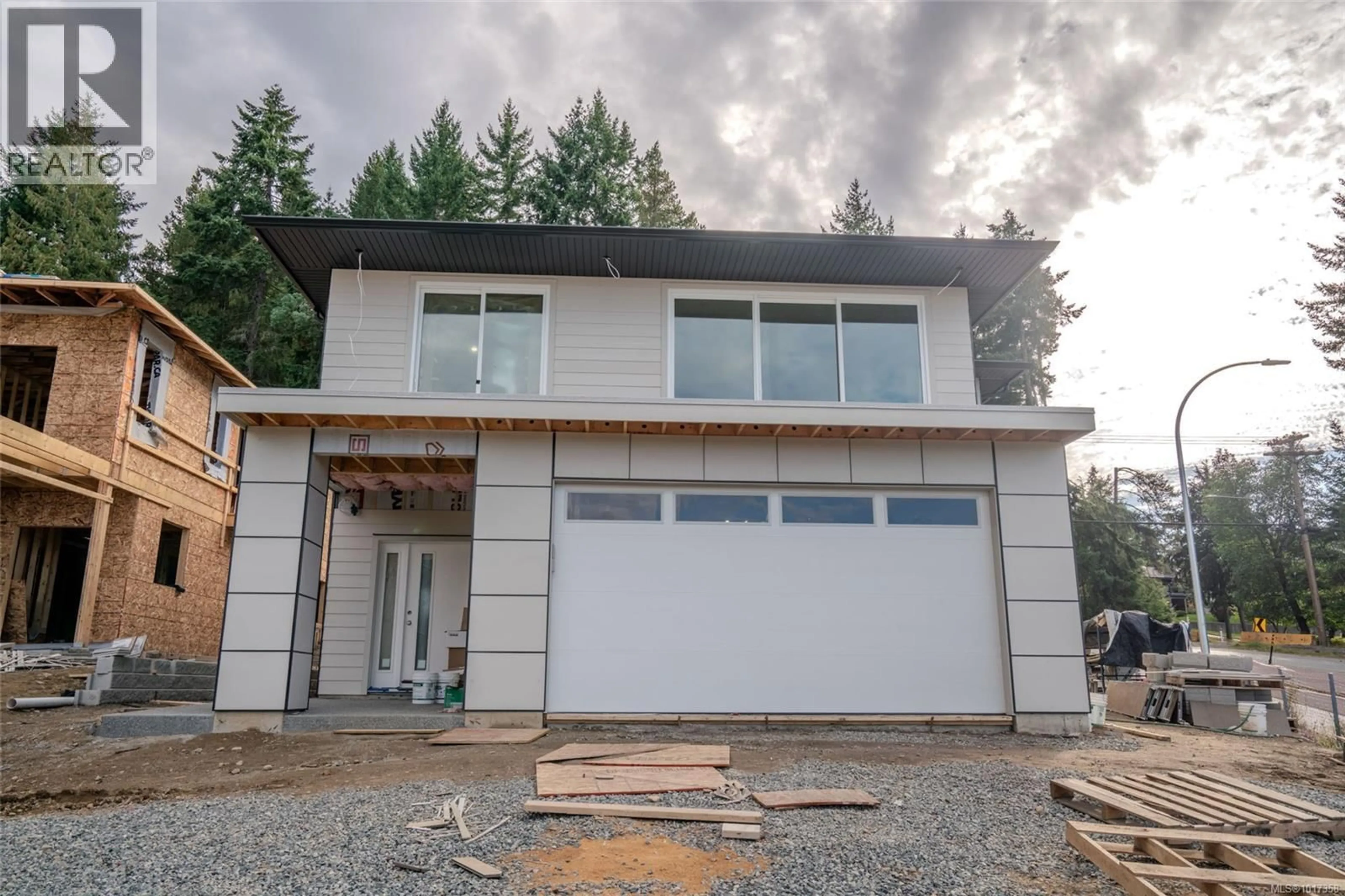 Home with vinyl exterior material, street for 5564 RUTHERFORD ROAD, Nanaimo British Columbia V9T5M8