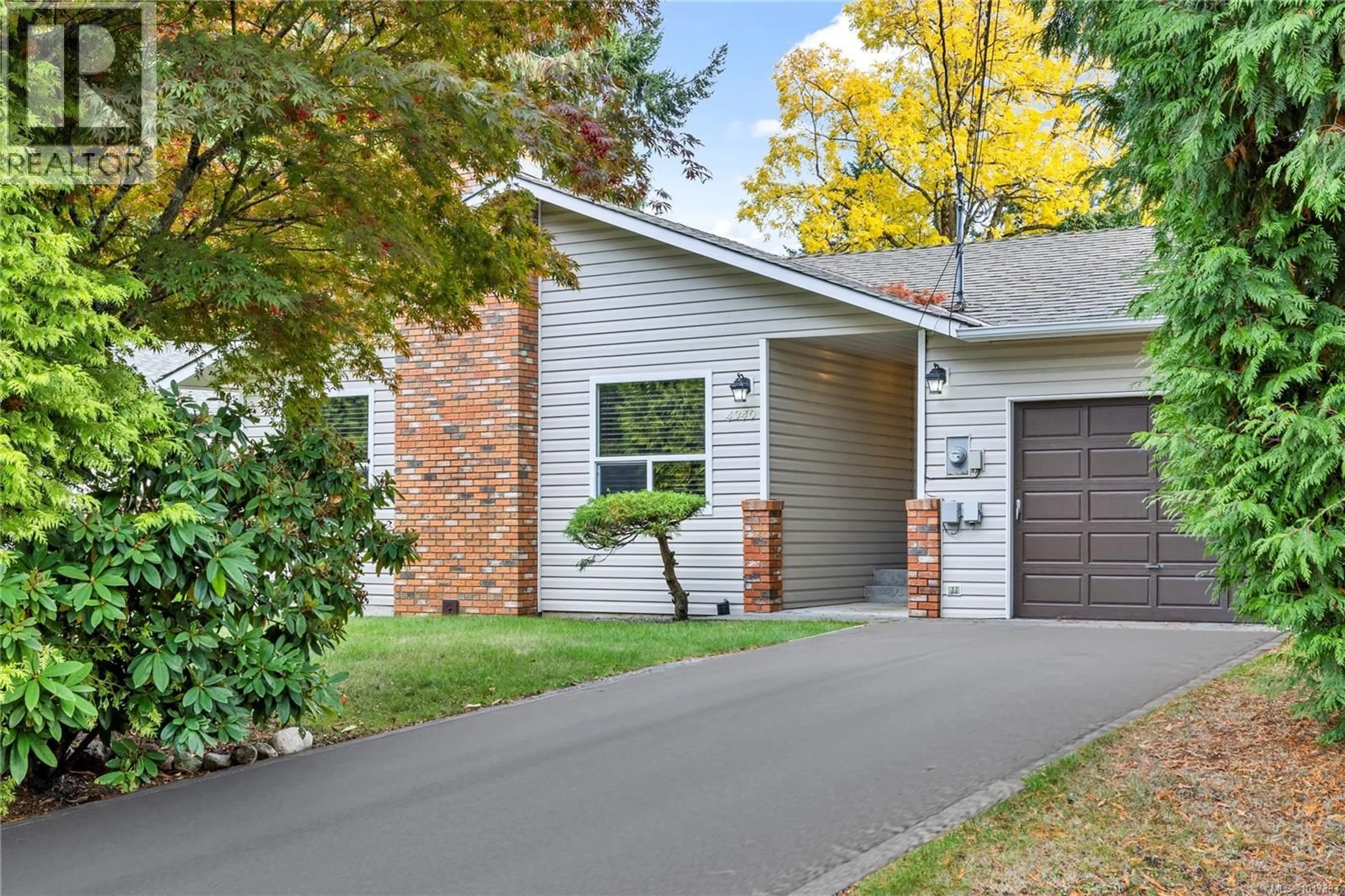 Home with brick exterior material, street for 4340 BUTTERNUT DRIVE, Nanaimo British Columbia V9T4J7