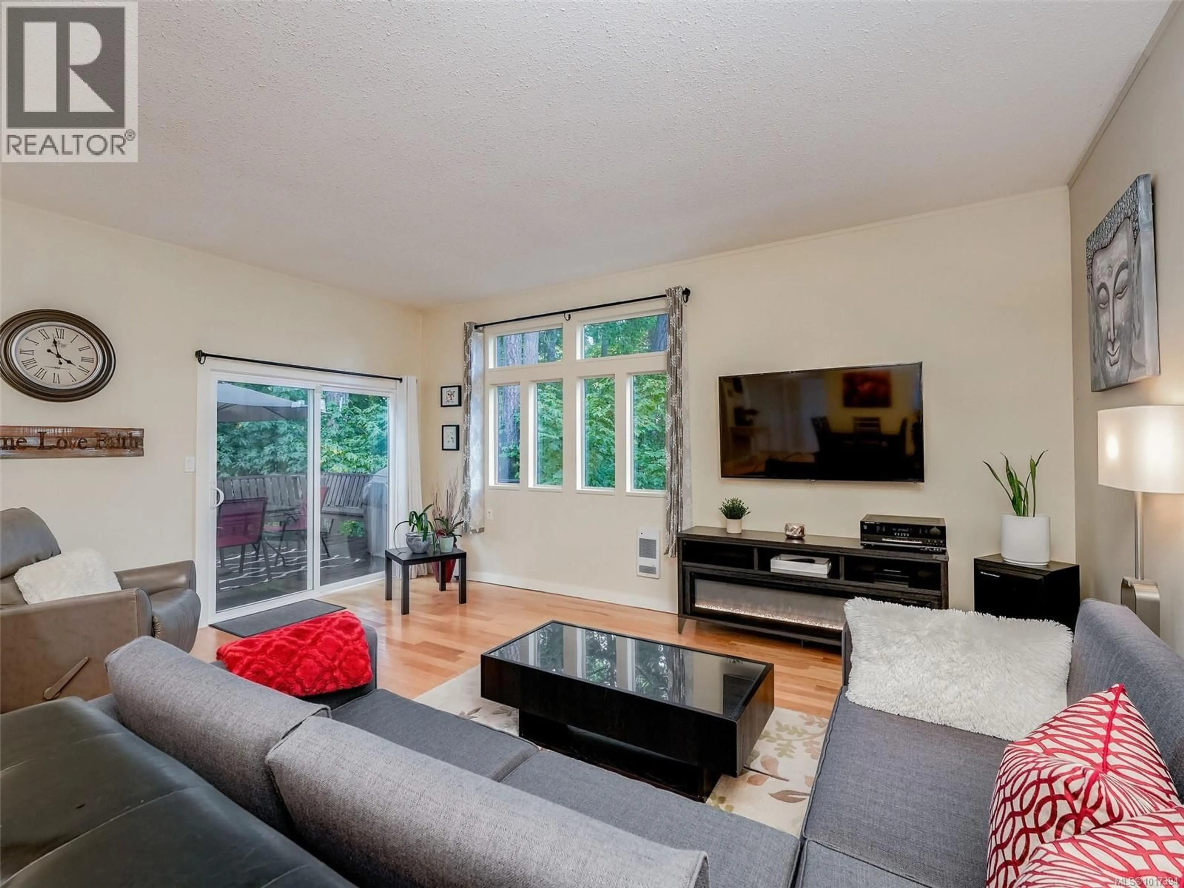 Living room with furniture, wood/laminate floor for 22 FALSTAFF PLACE, View Royal British Columbia V9A7A5