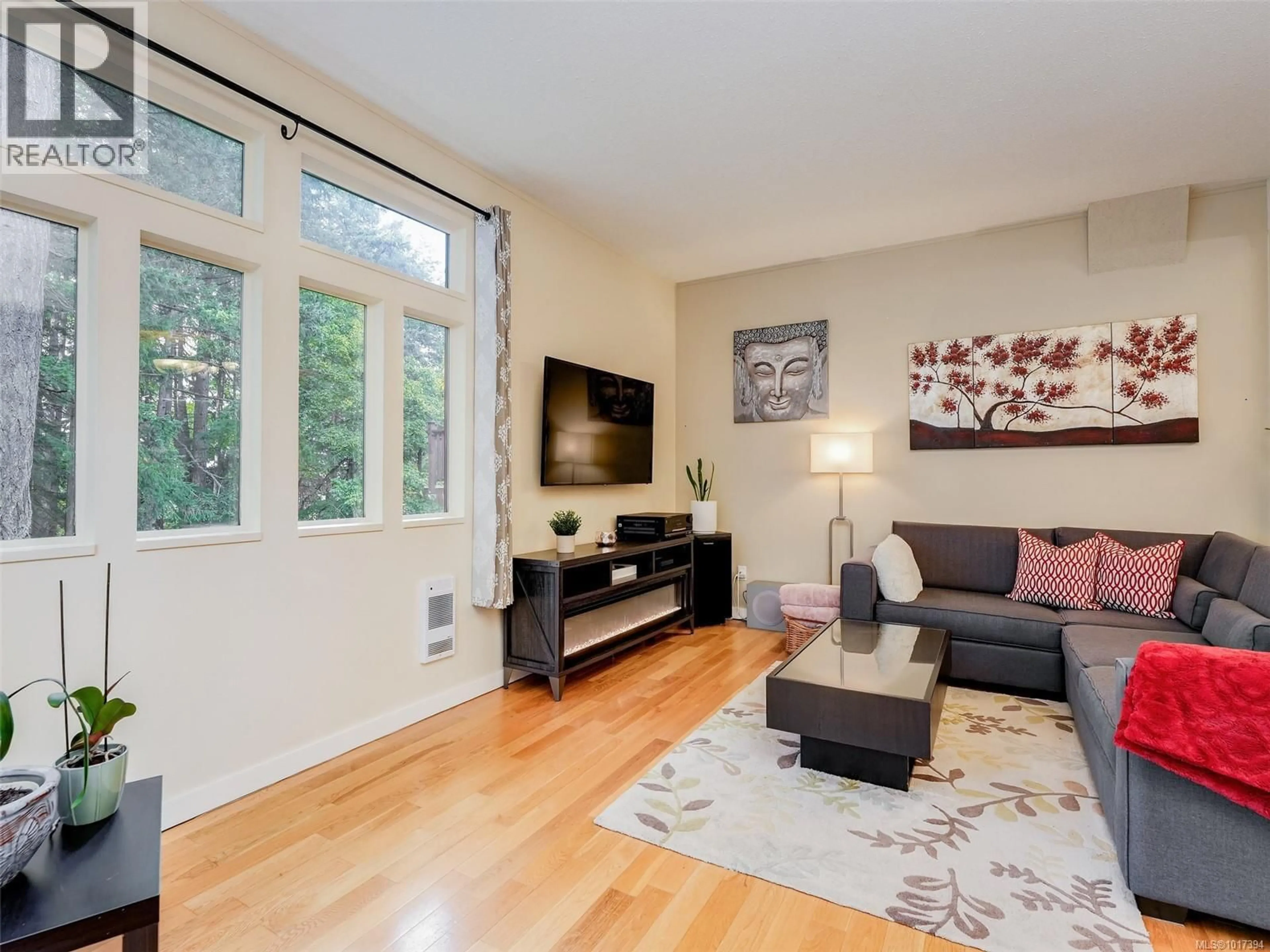 Living room with furniture, wood/laminate floor for 22 FALSTAFF PLACE, View Royal British Columbia V9A7A5