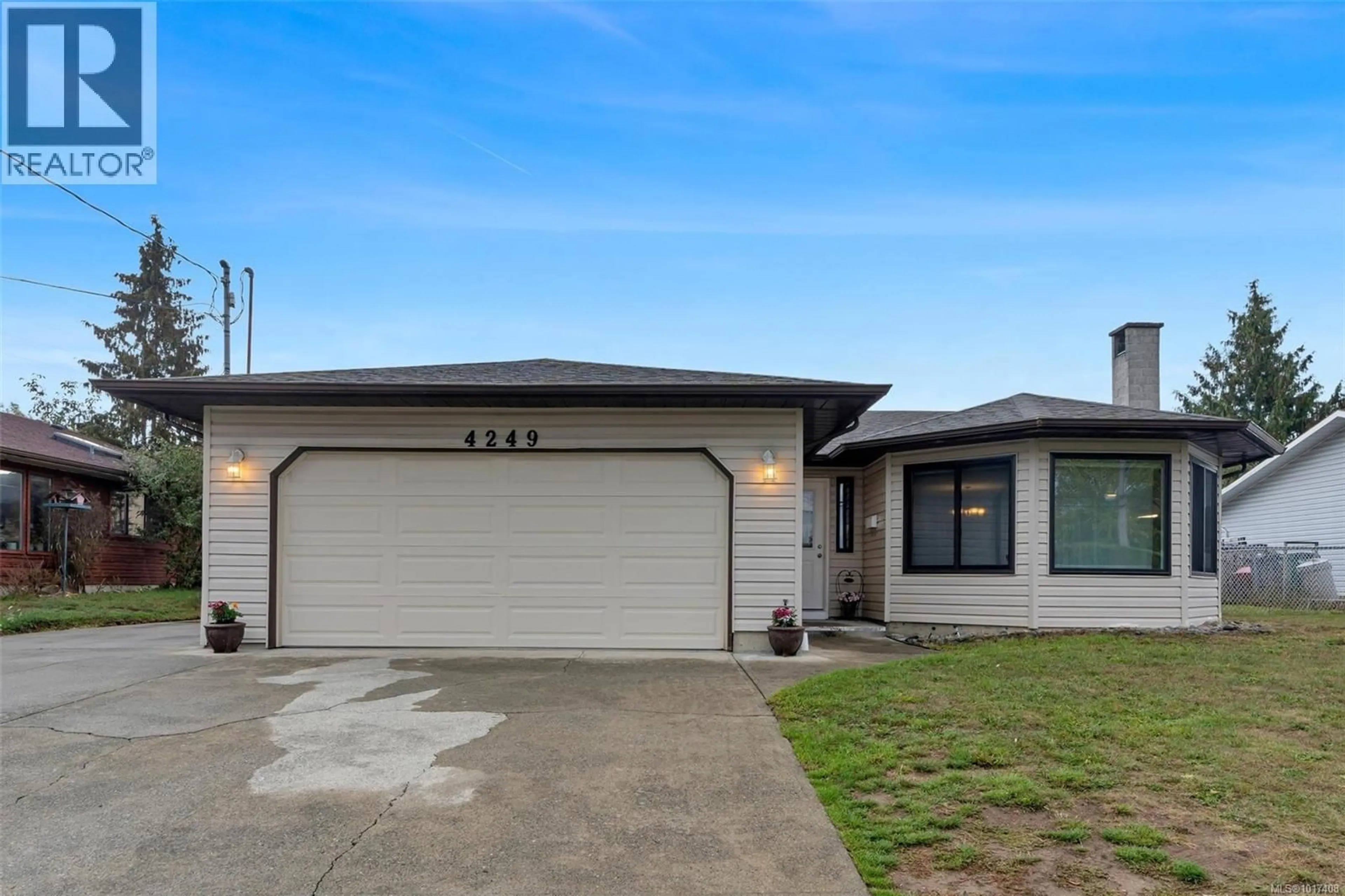 Home with vinyl exterior material, street for 4249 QUADRA STREET, Saanich British Columbia V8X1L5