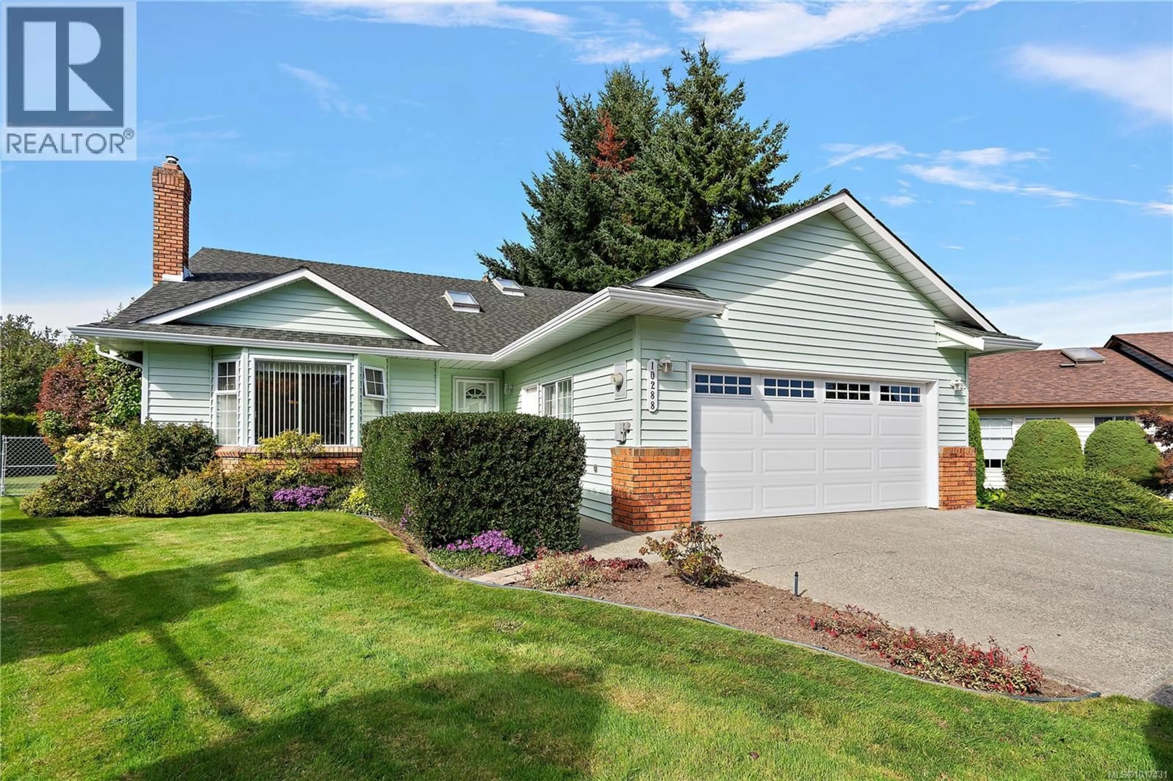 Home with vinyl exterior material, street for 10288 CLEVELAND ROAD, Sidney British Columbia V8L4X9